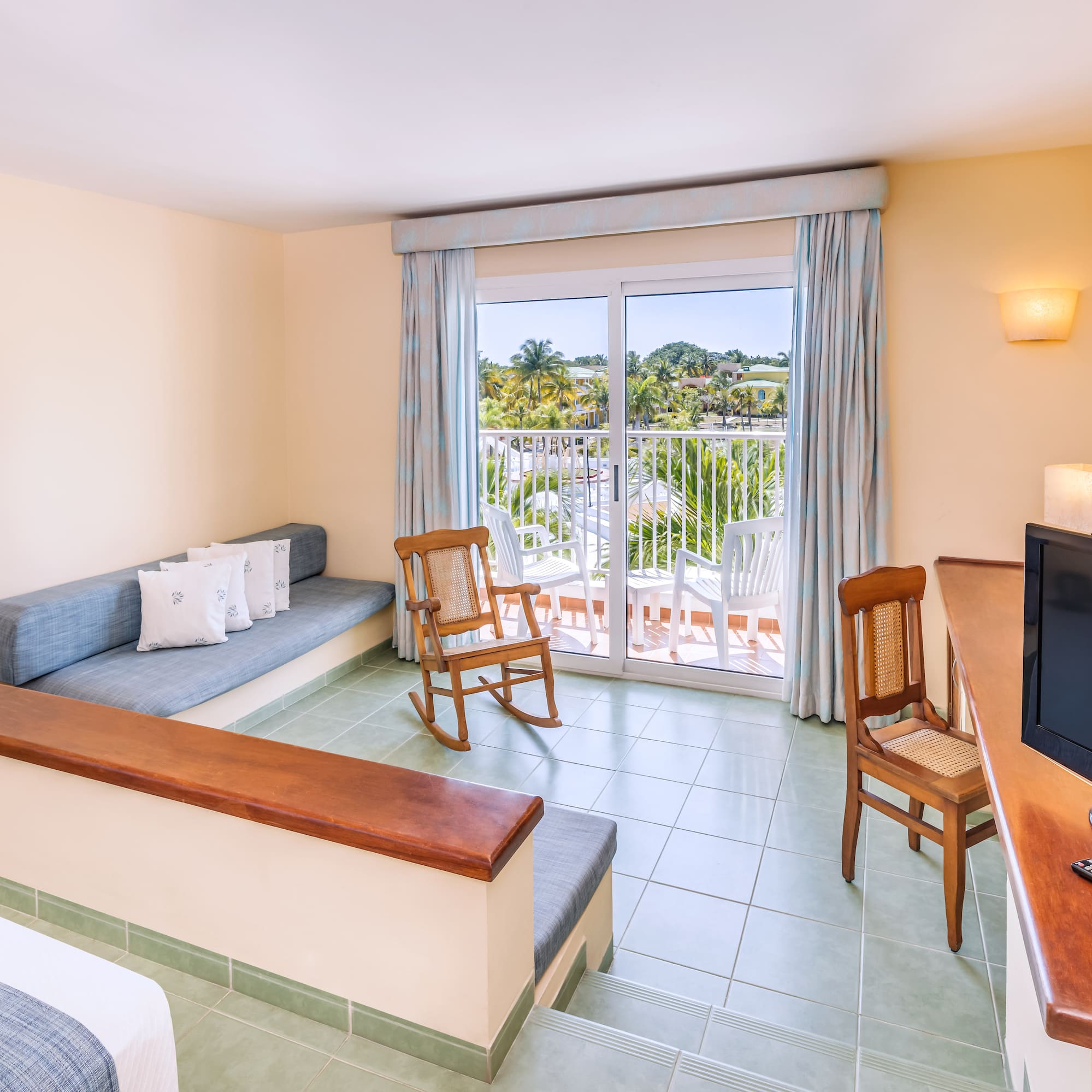 a room with a television and a couch