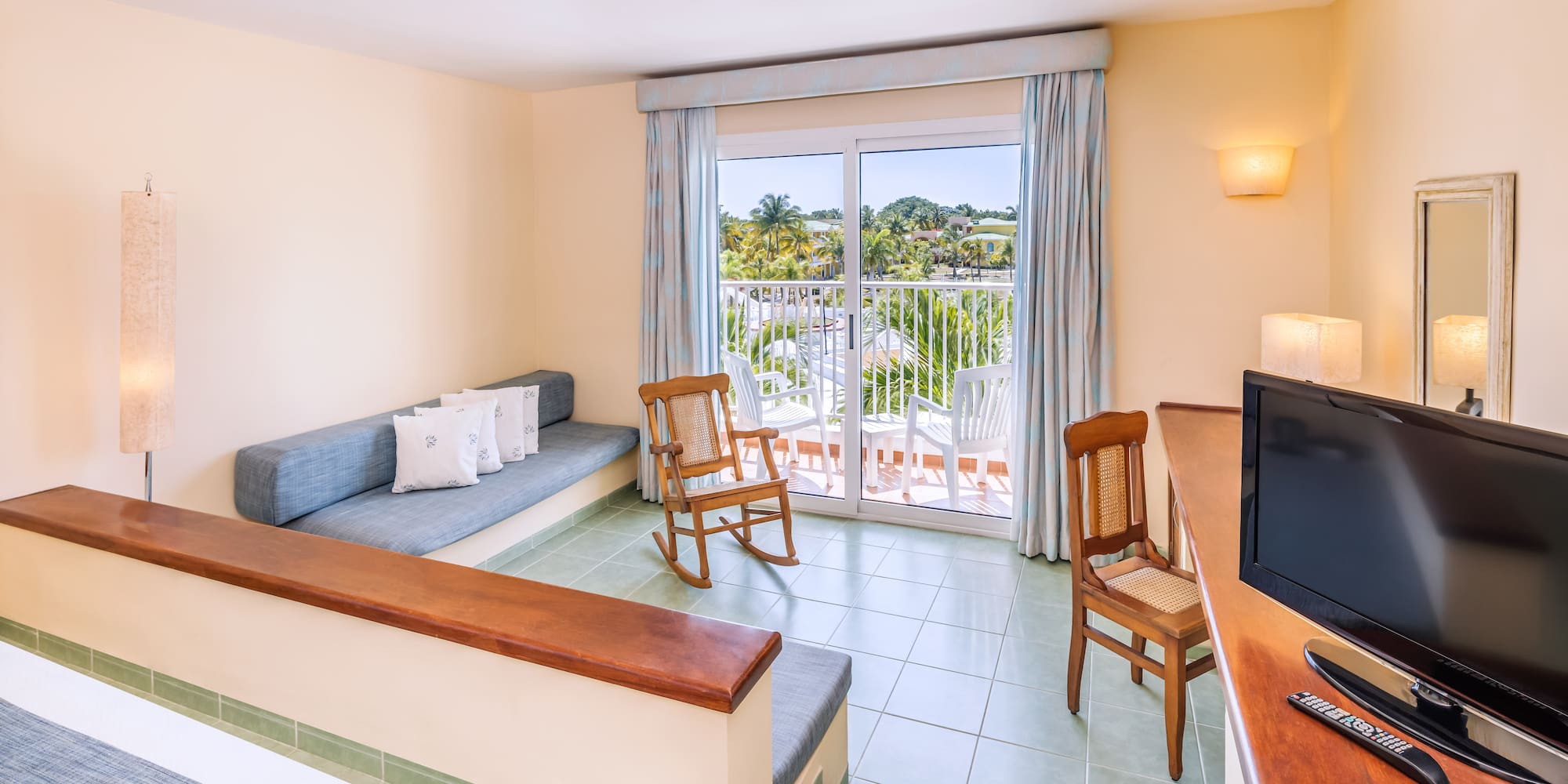 a room with a television and a couch