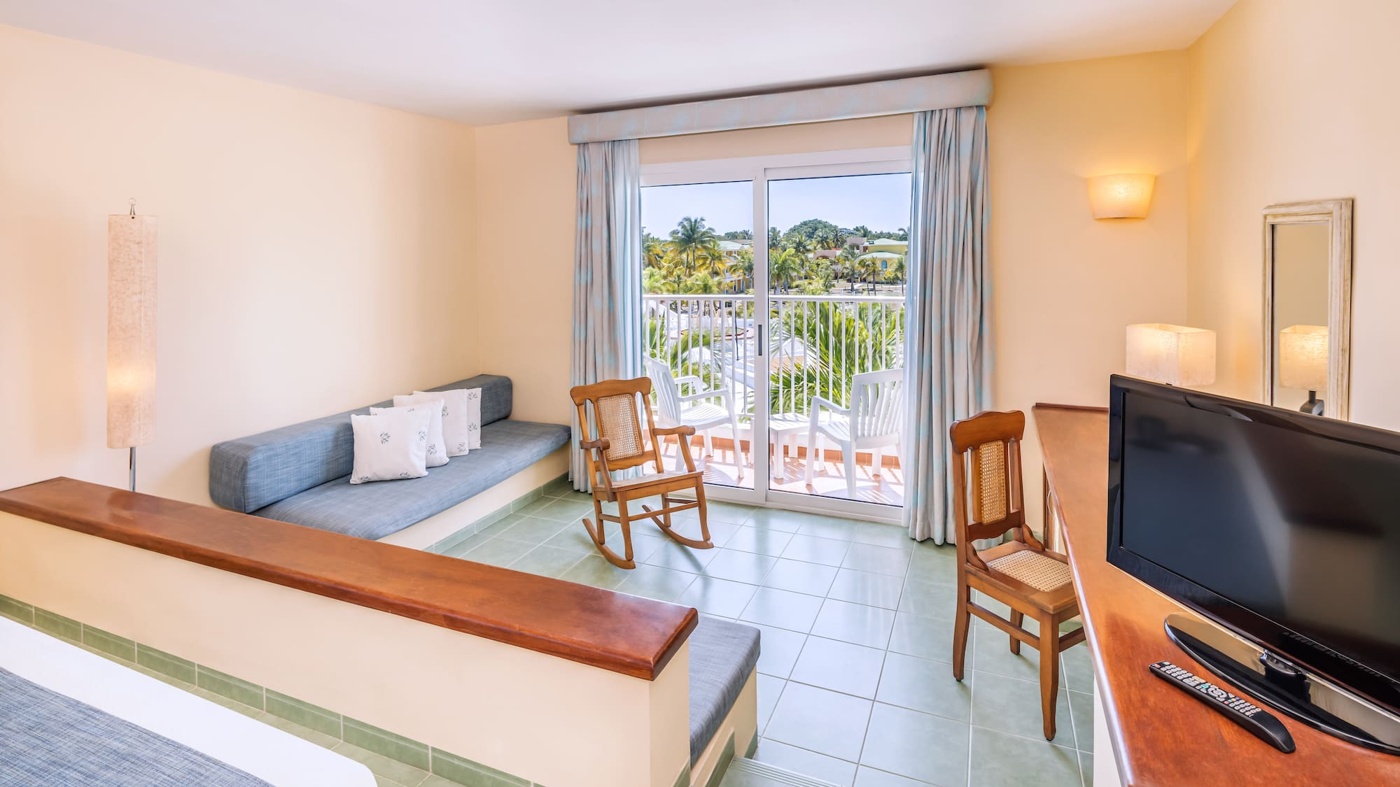 a room with a television and a couch