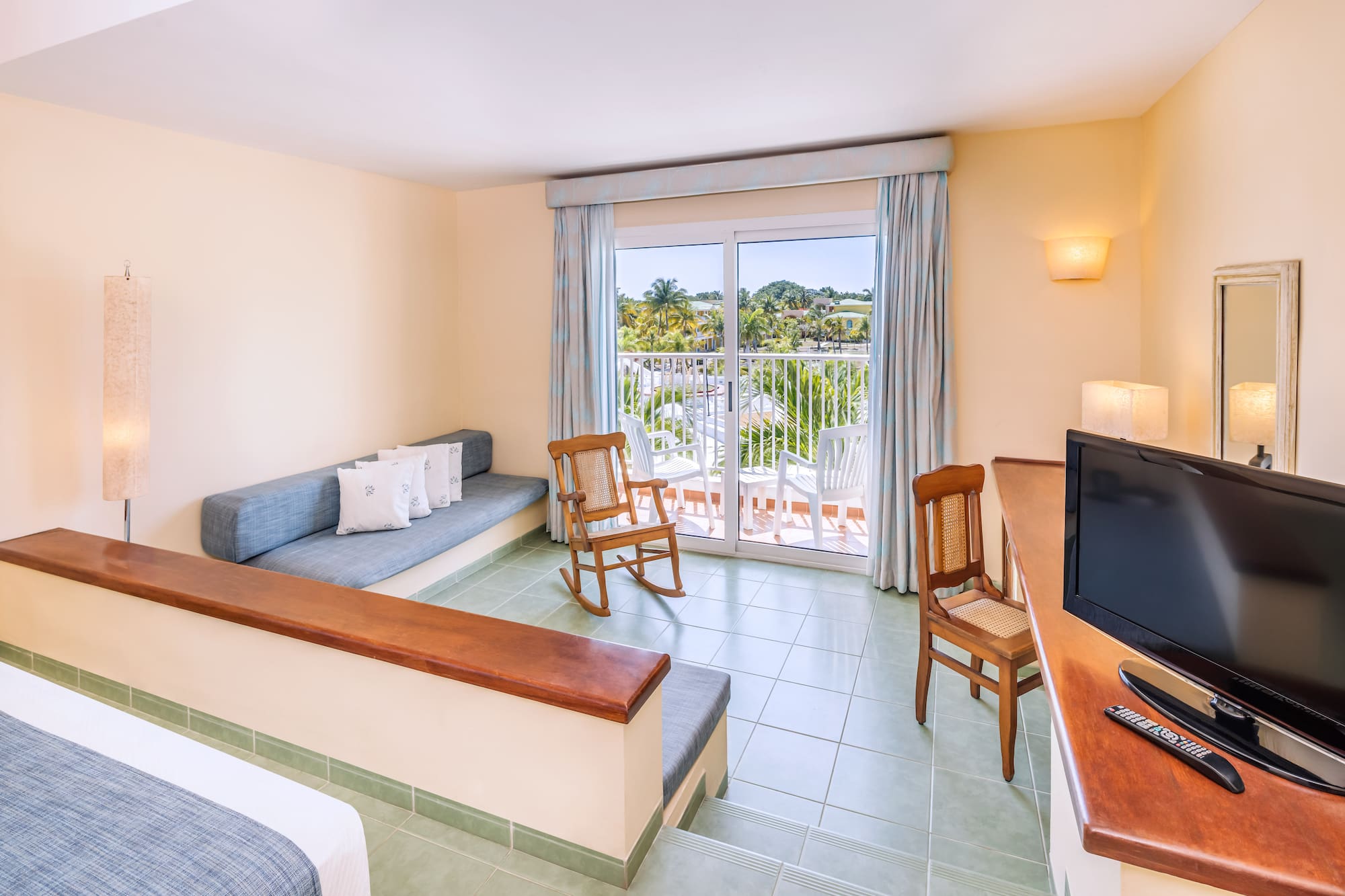 a room with a television and a couch