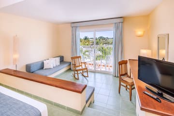 a room with a television and a couch