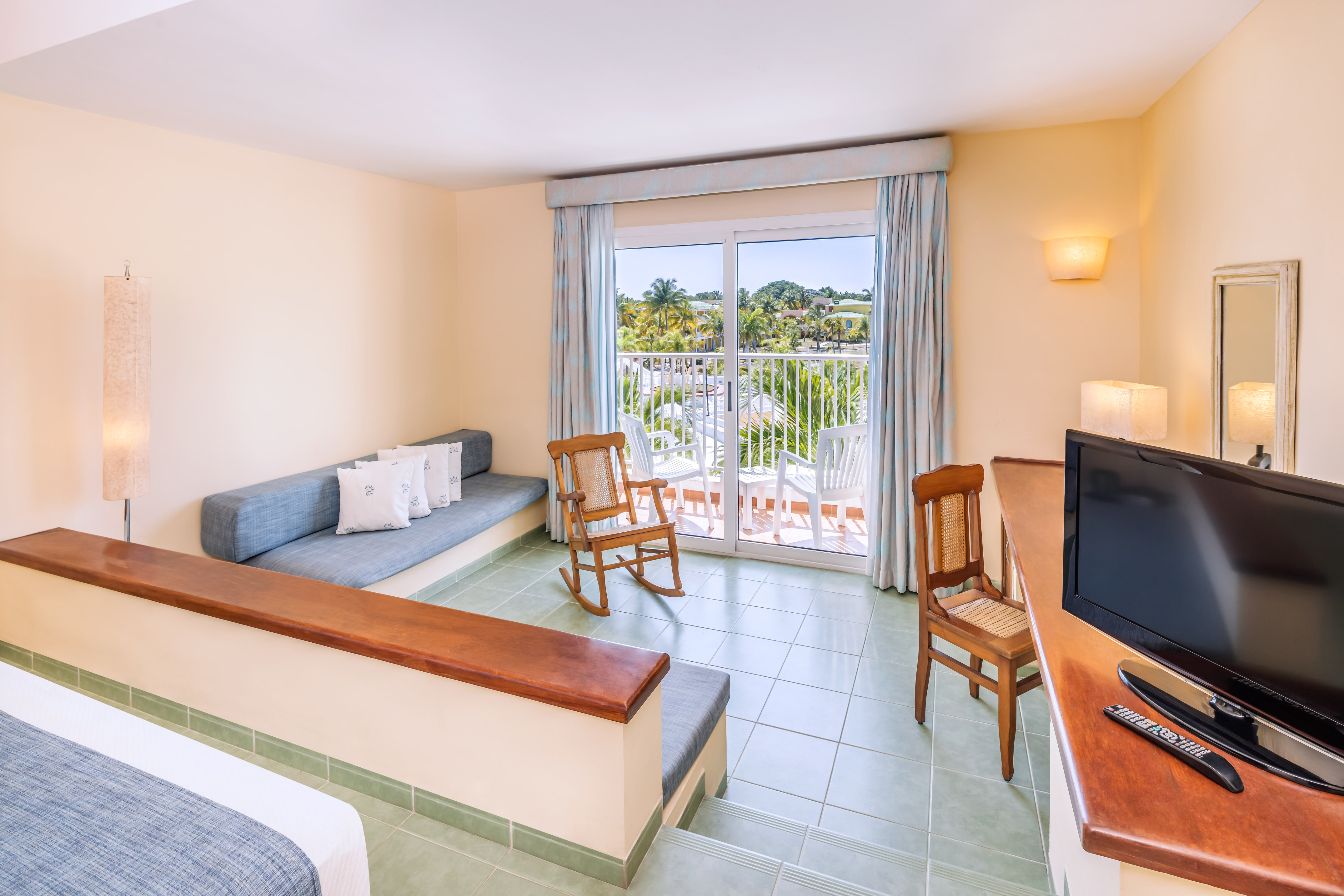 a room with a television and a couch