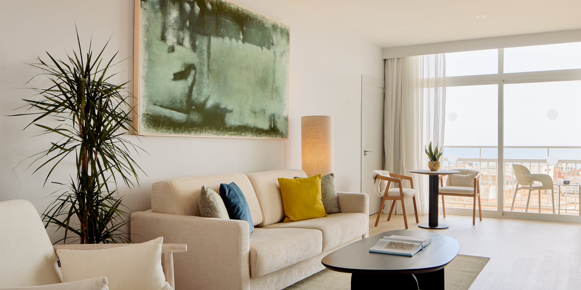 a living room with a couch and a table