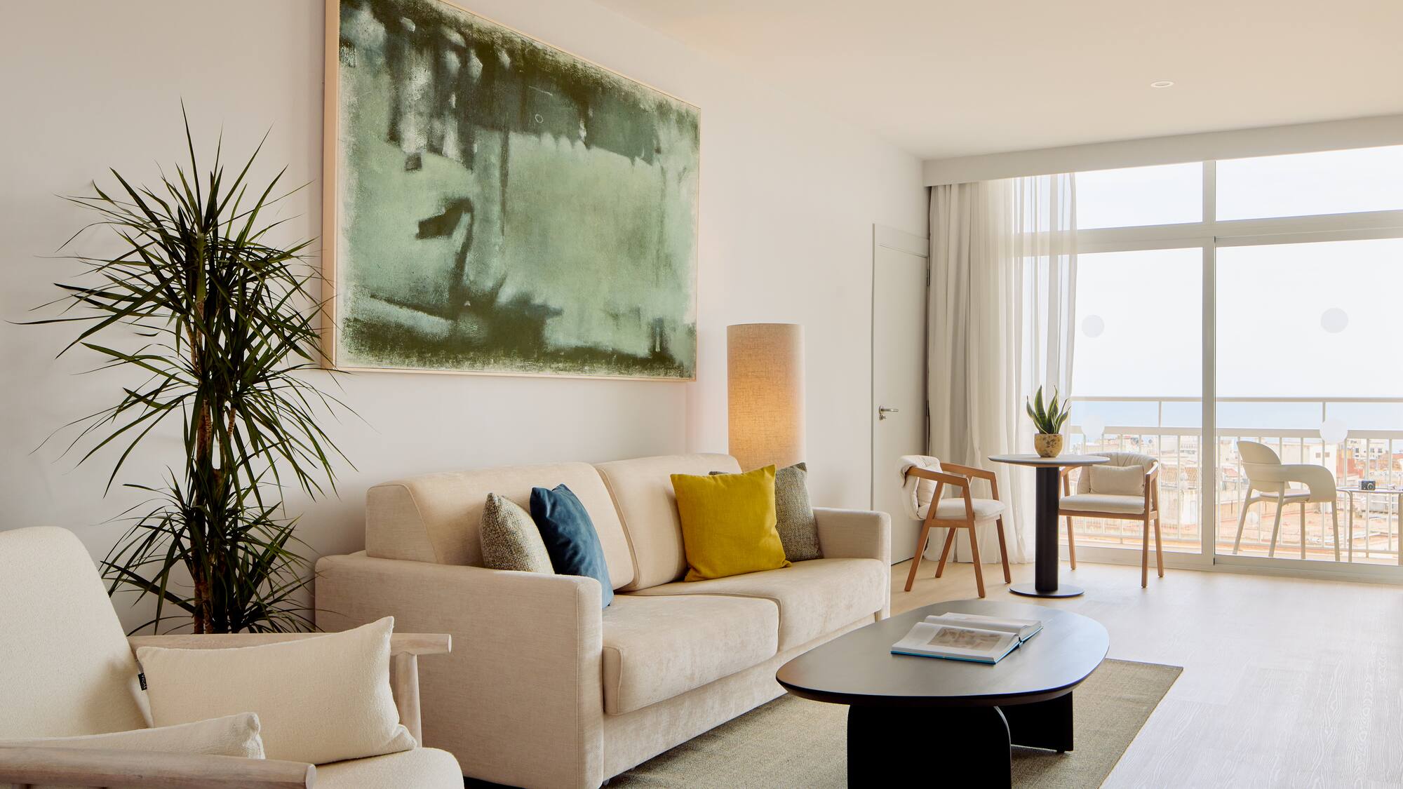 a living room with a couch and a table