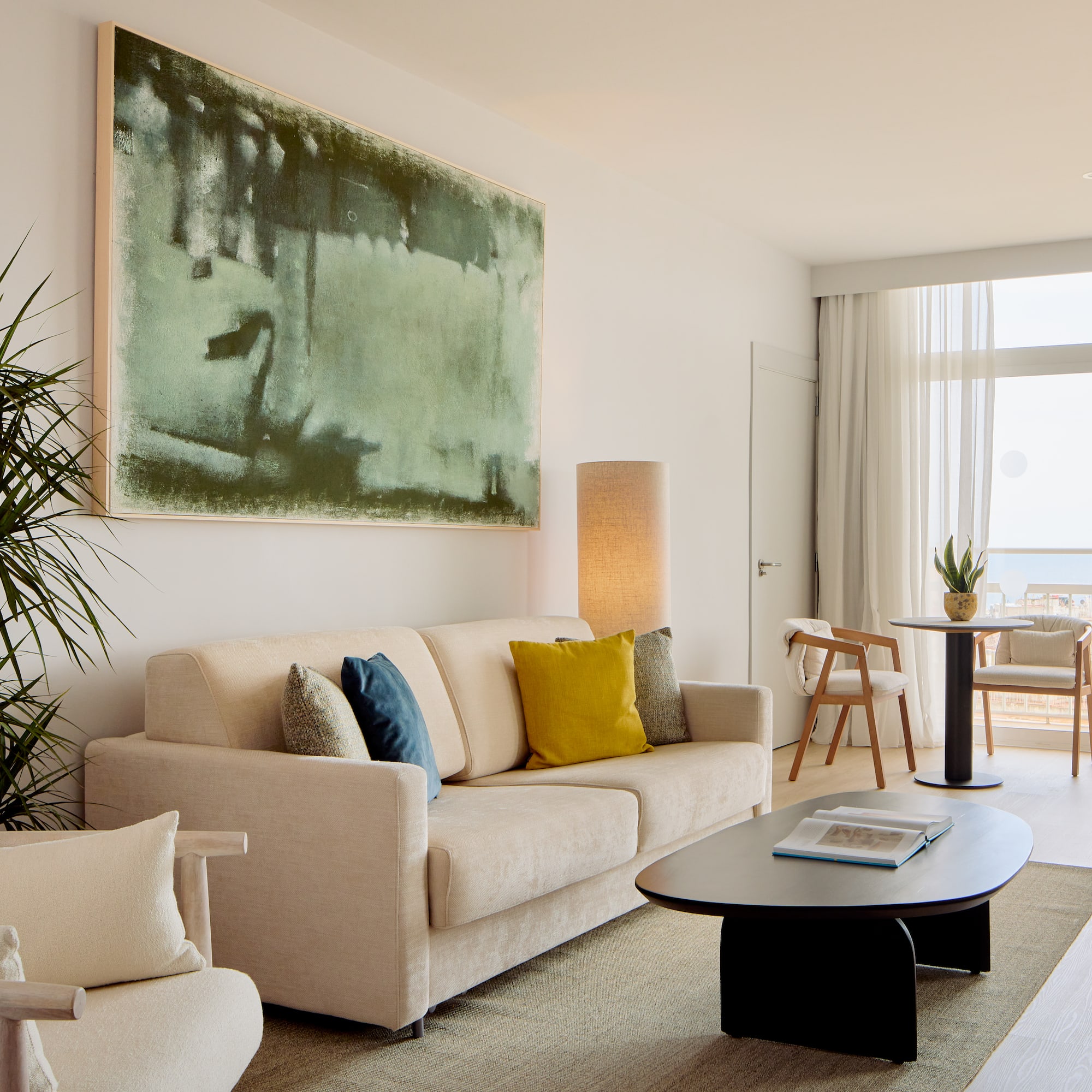 a living room with a couch and a table