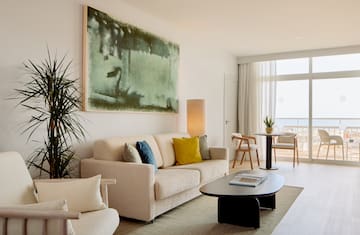 a living room with a couch and a table