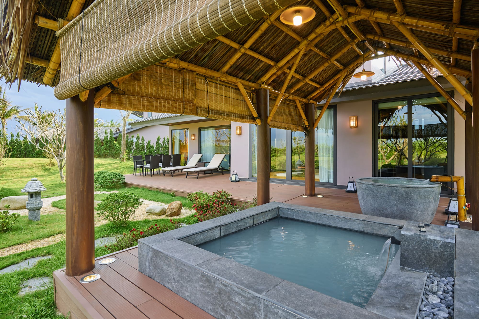 a hot tub and a covered patio
