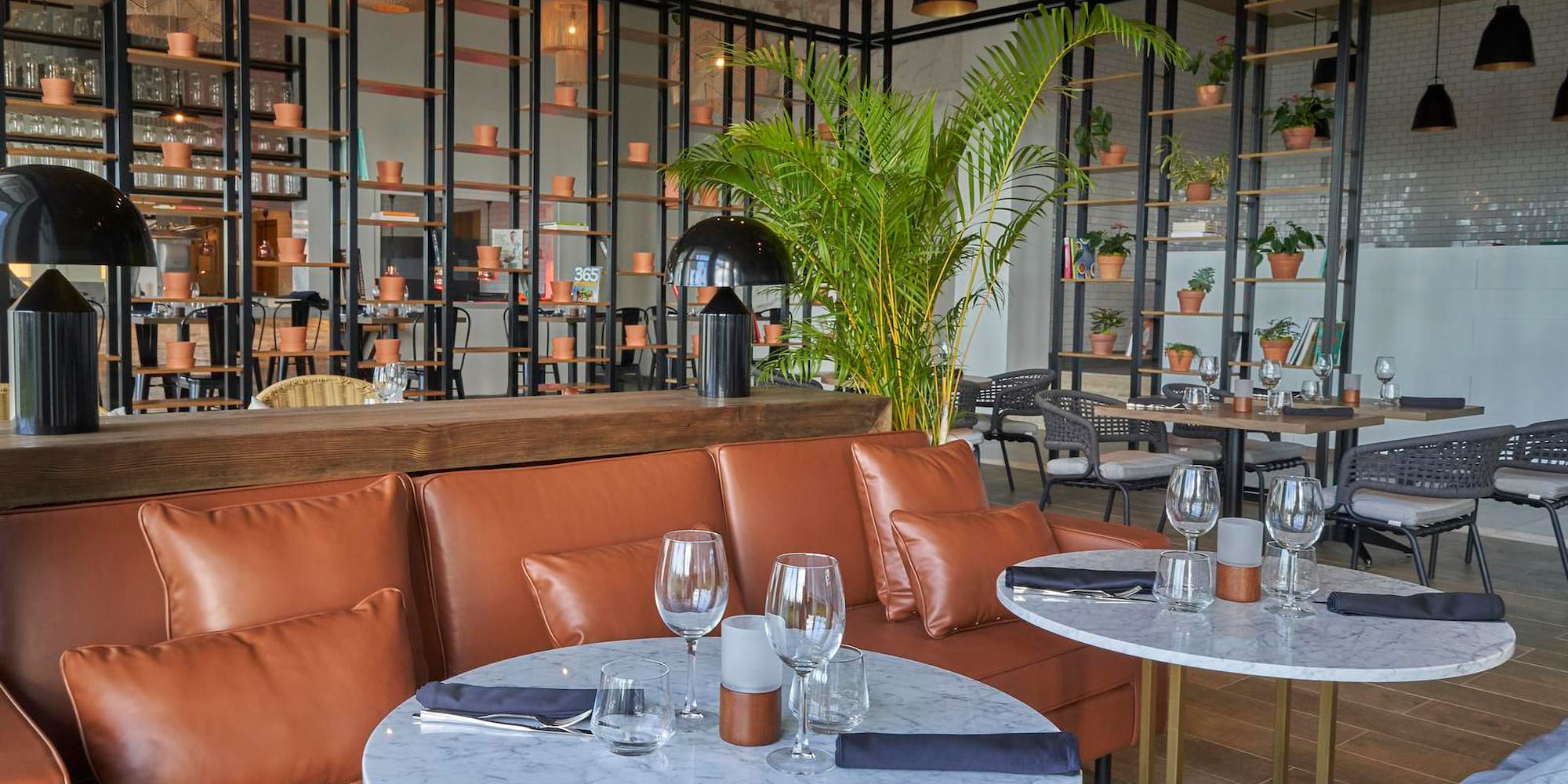 a restaurant with tables and chairs