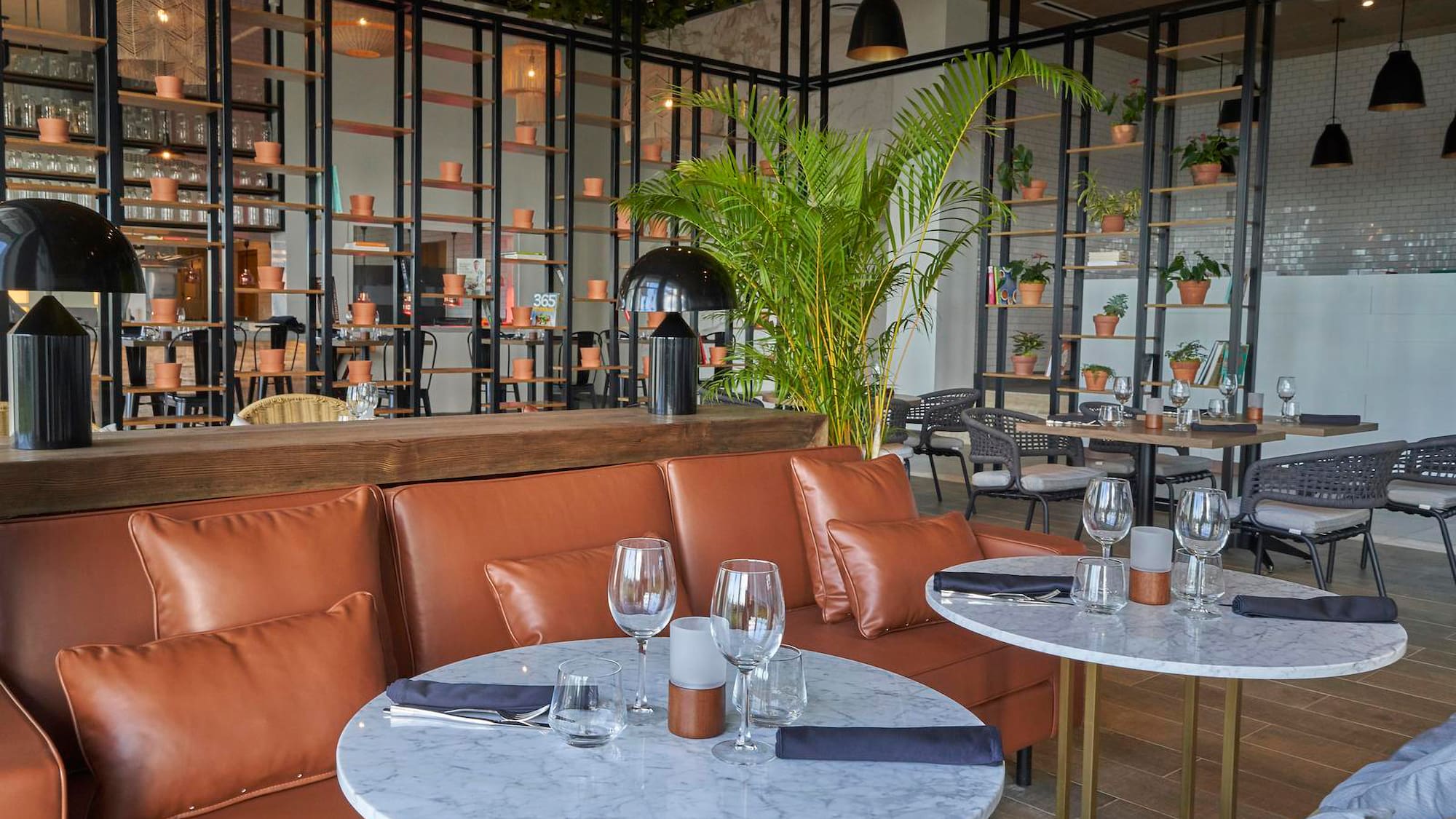 a restaurant with tables and chairs