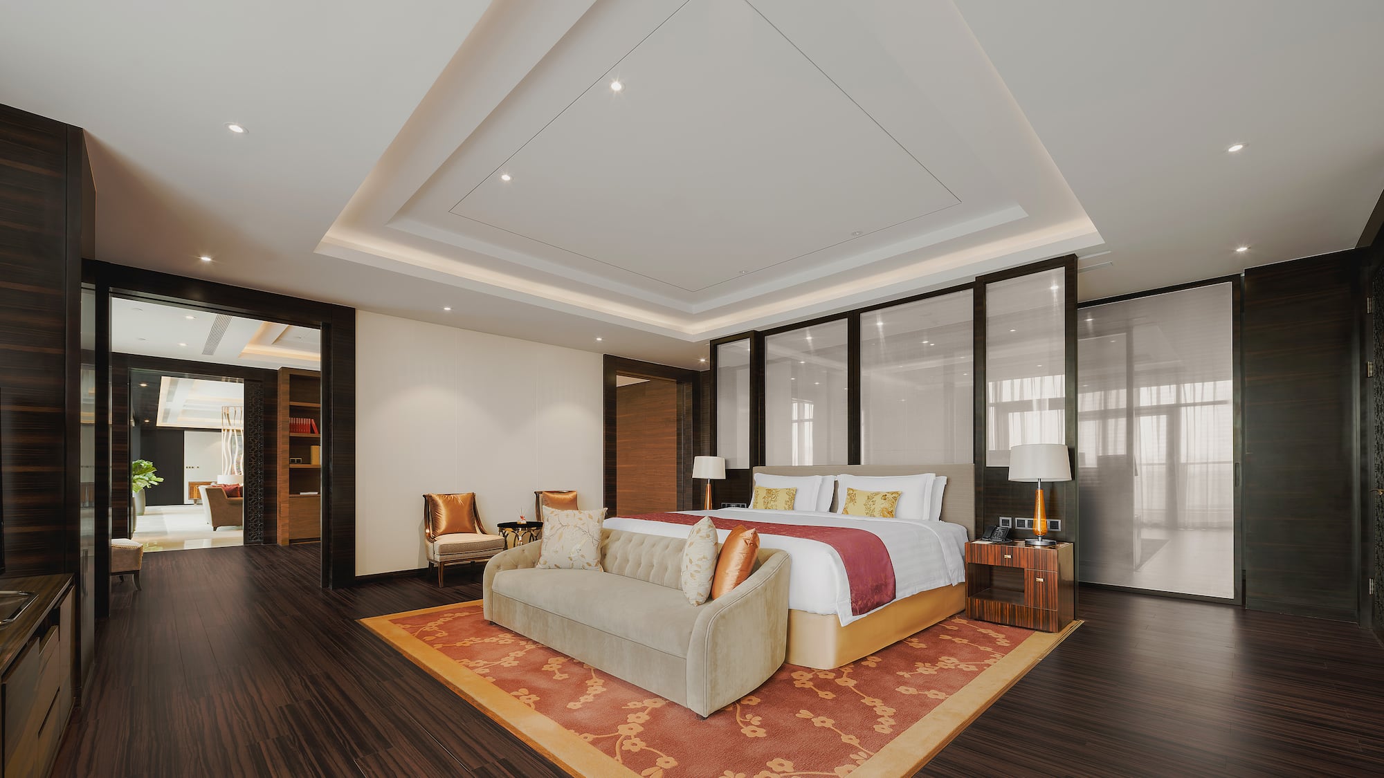 a room with a bed and a rug