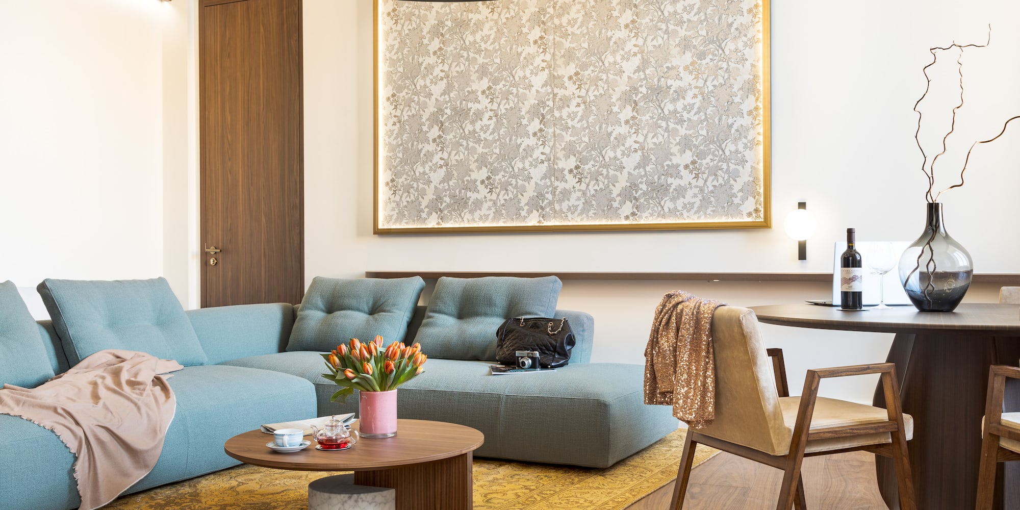 a living room with a couch and a table