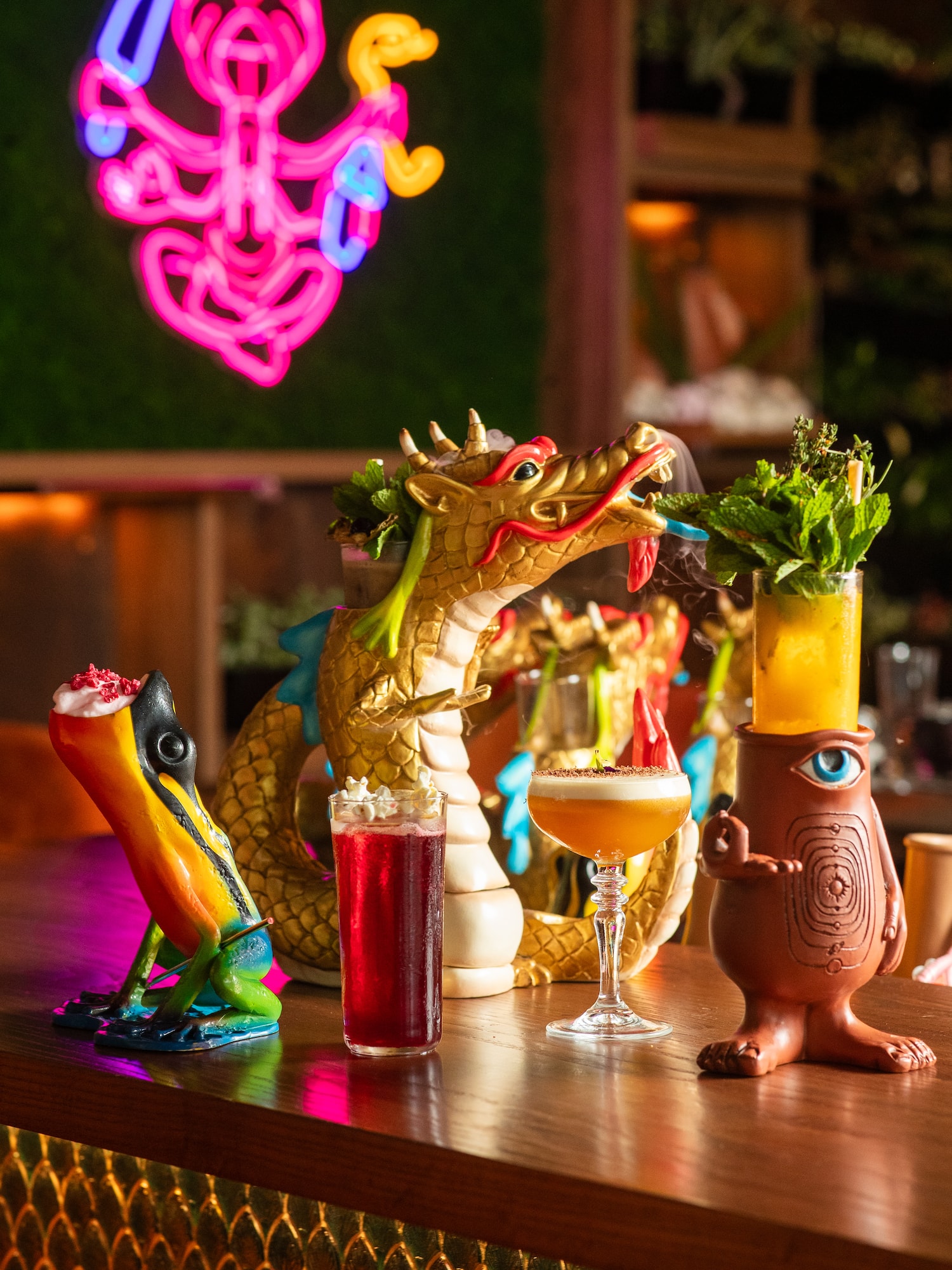 a dragon figurines on a bar