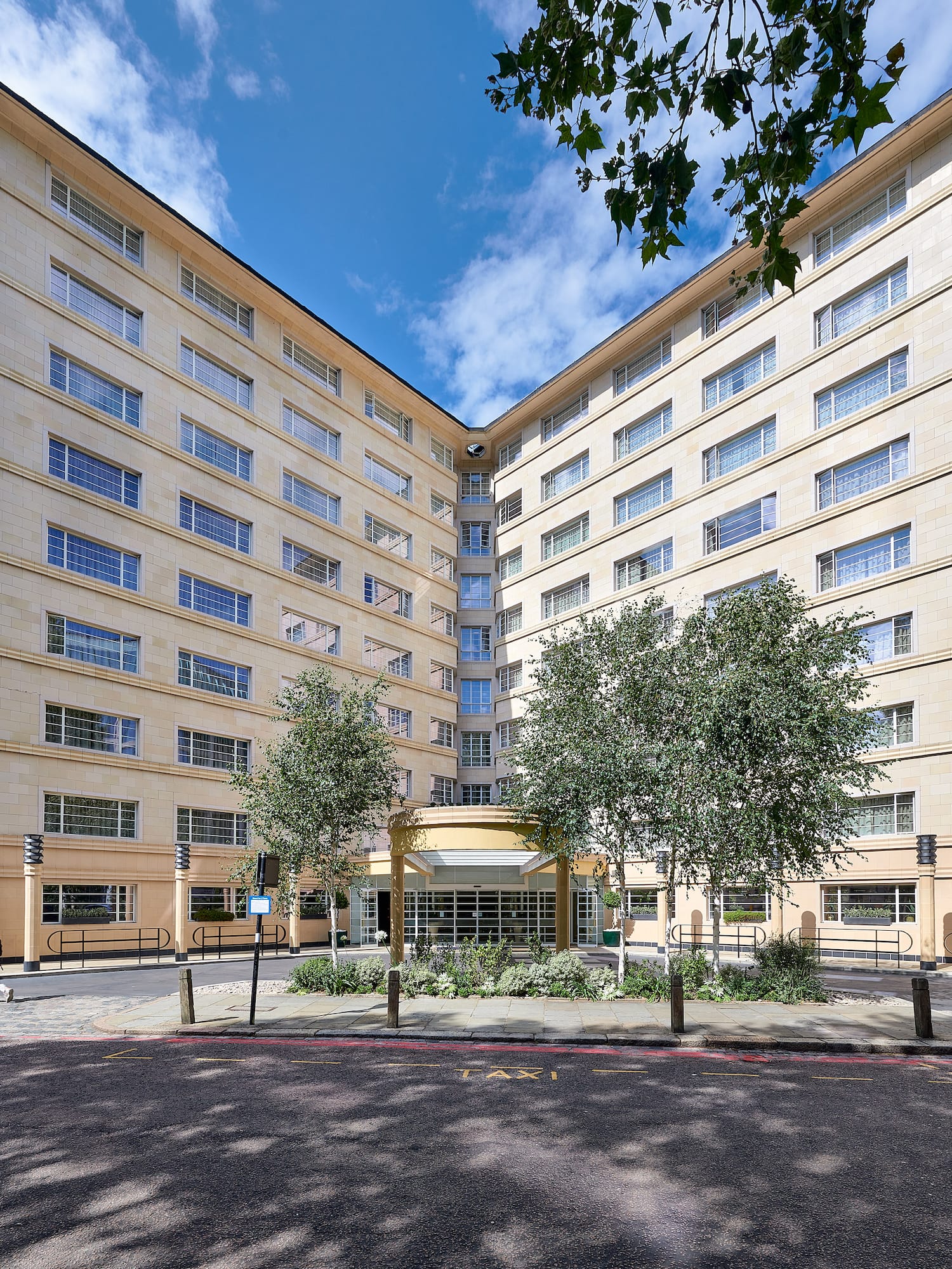 a building with trees in front of it