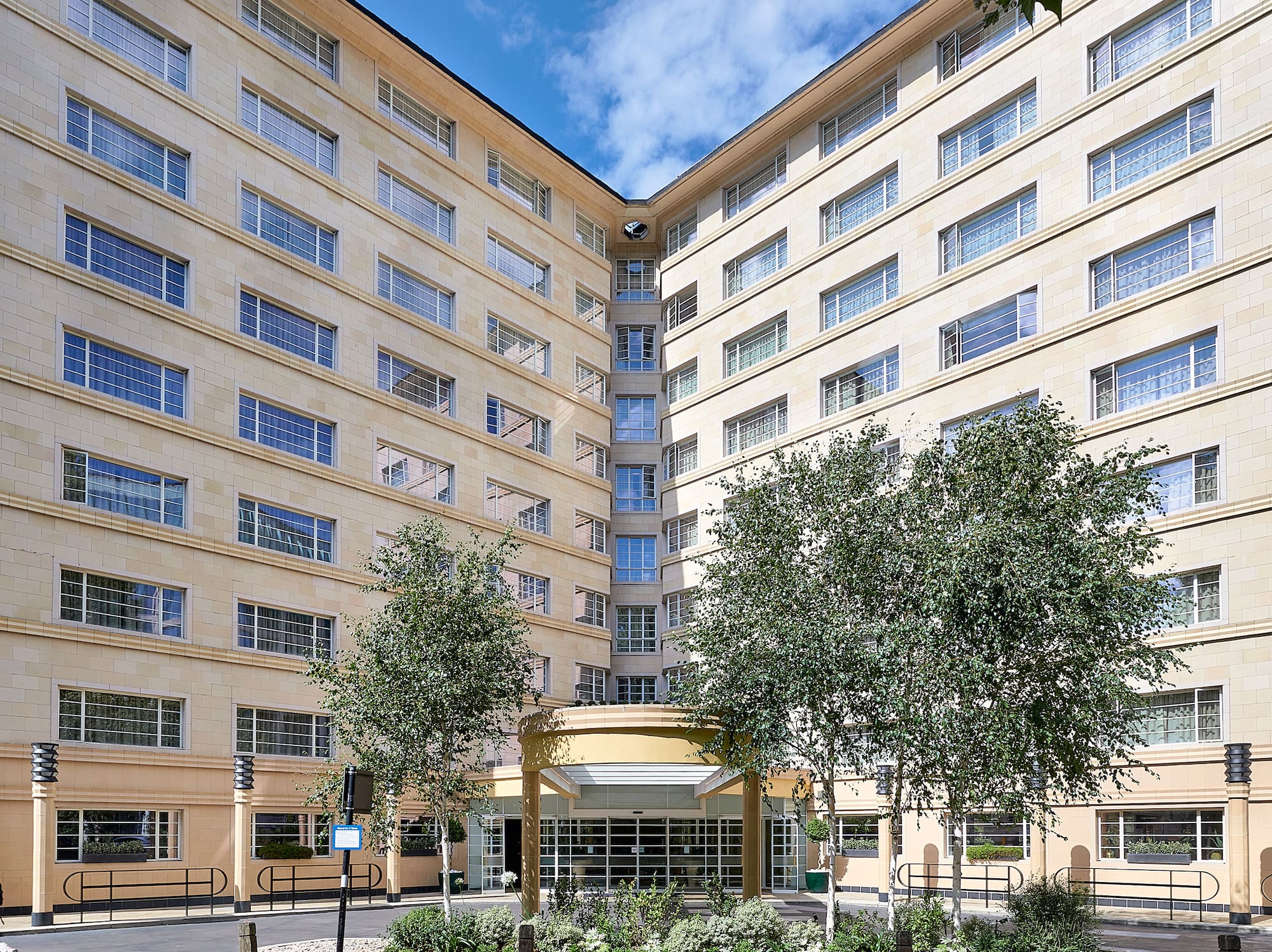a building with trees in front of it