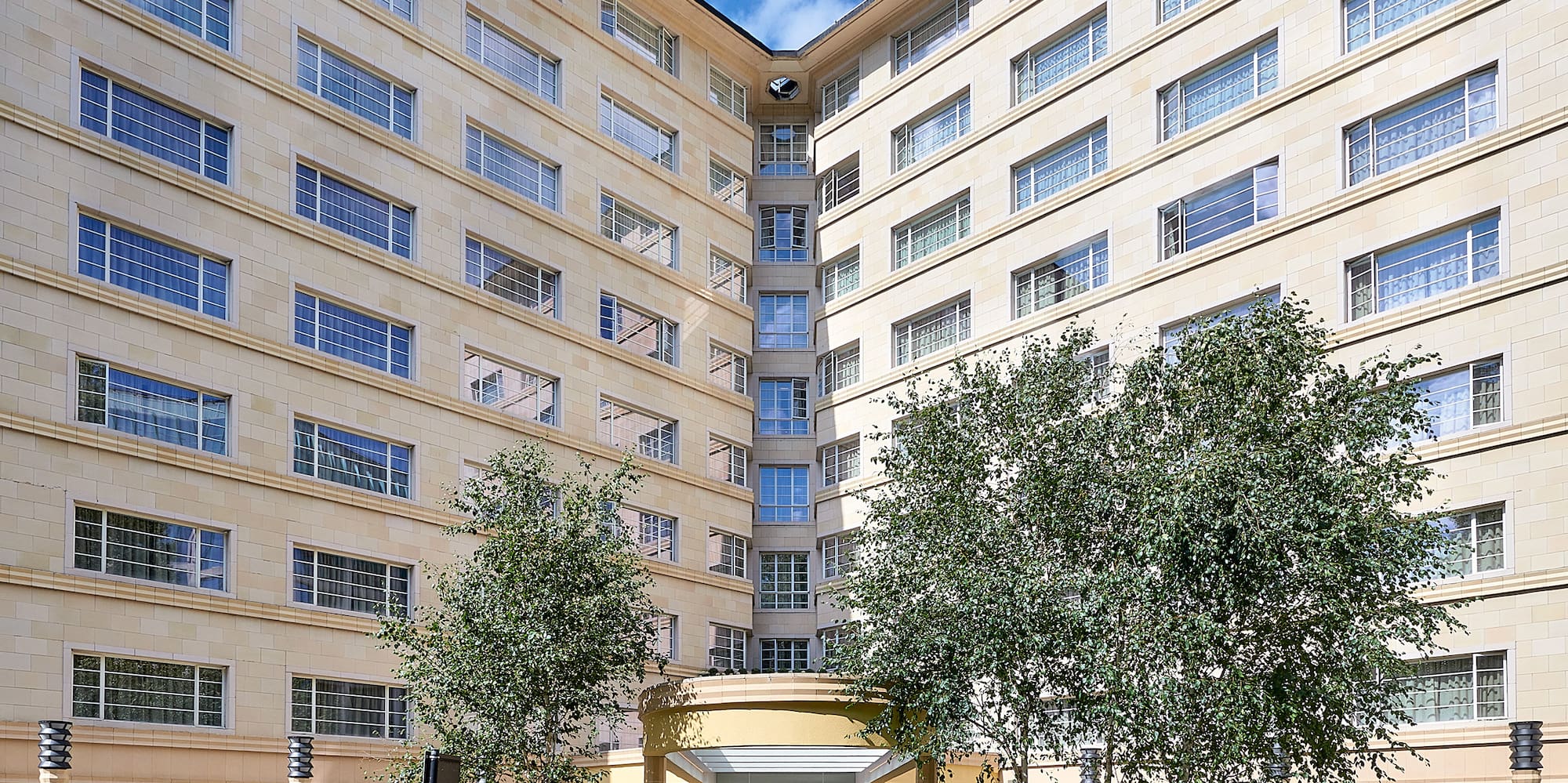 a building with trees in front of it