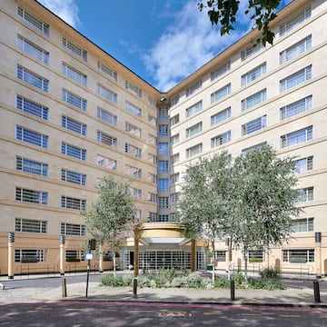a building with trees in front of it