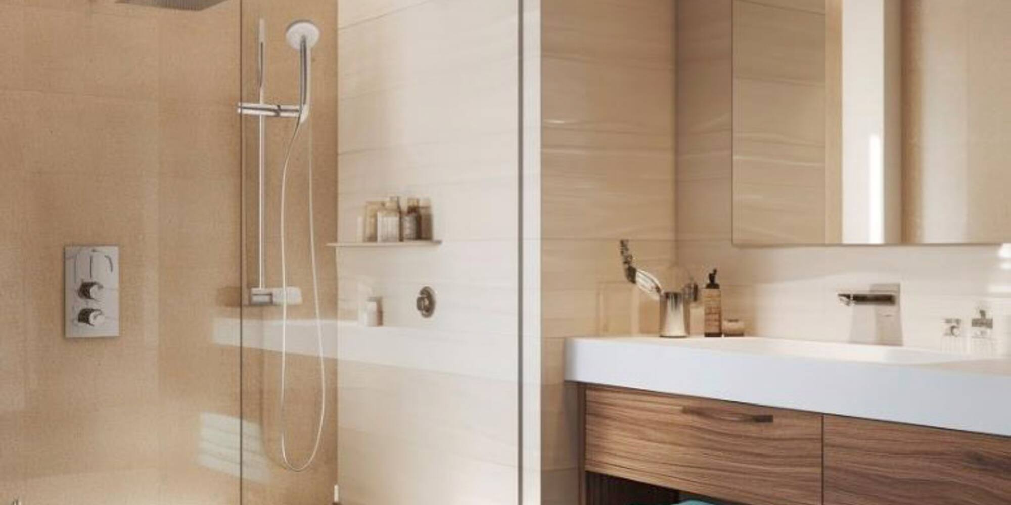 a bathroom with a glass shower and sink