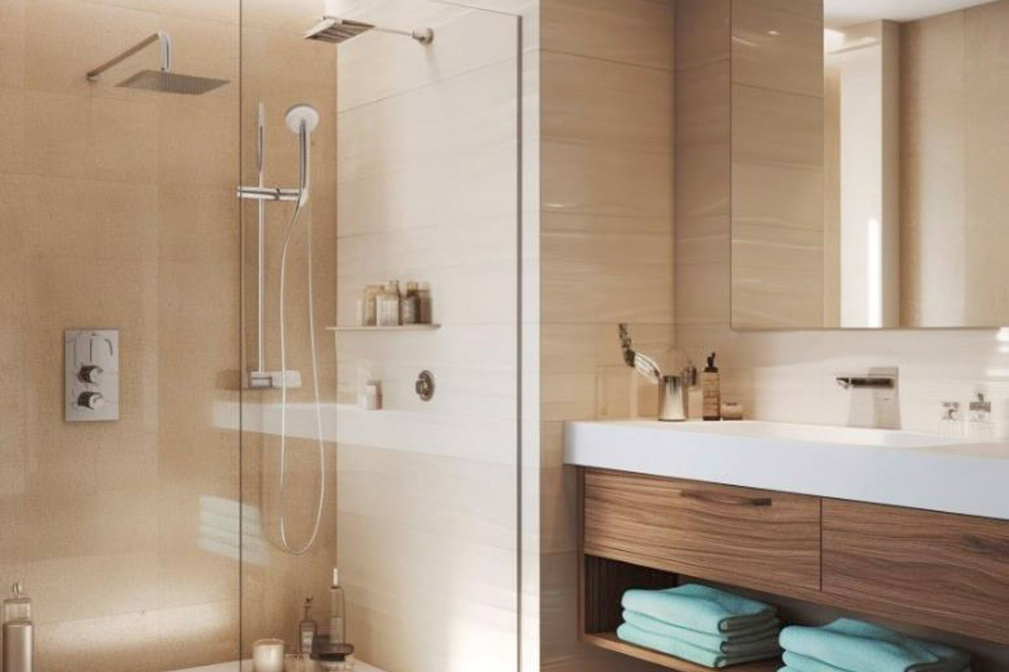 a bathroom with a glass shower and sink