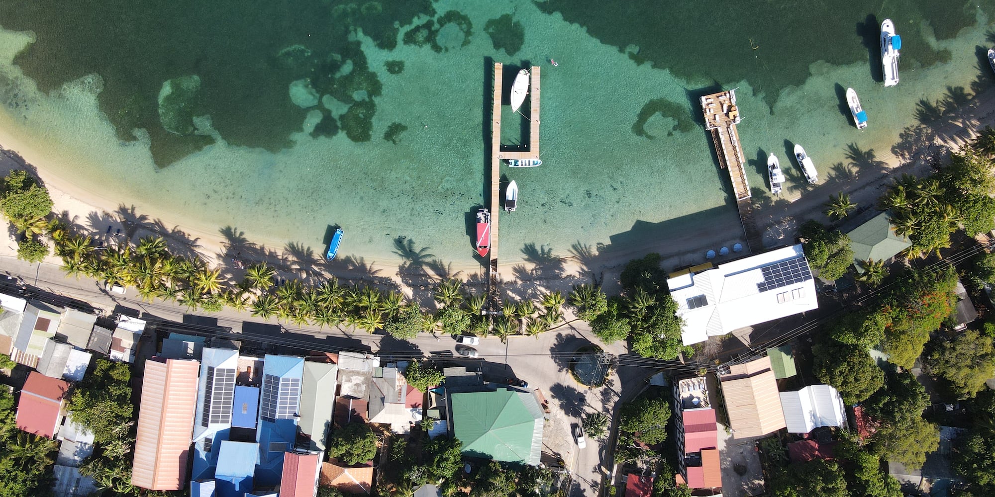 a body of water with boats and buildings