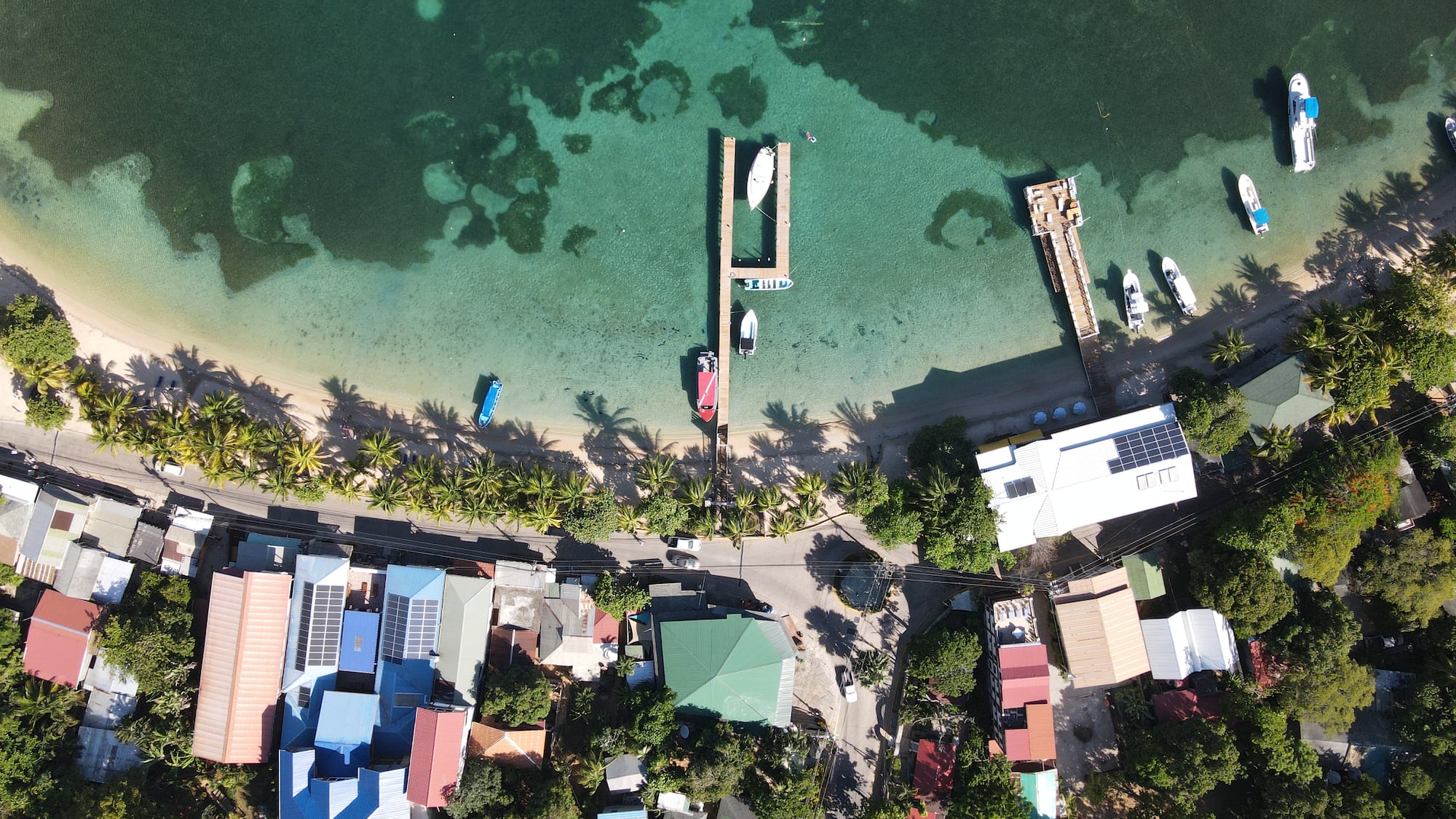 a body of water with boats and buildings