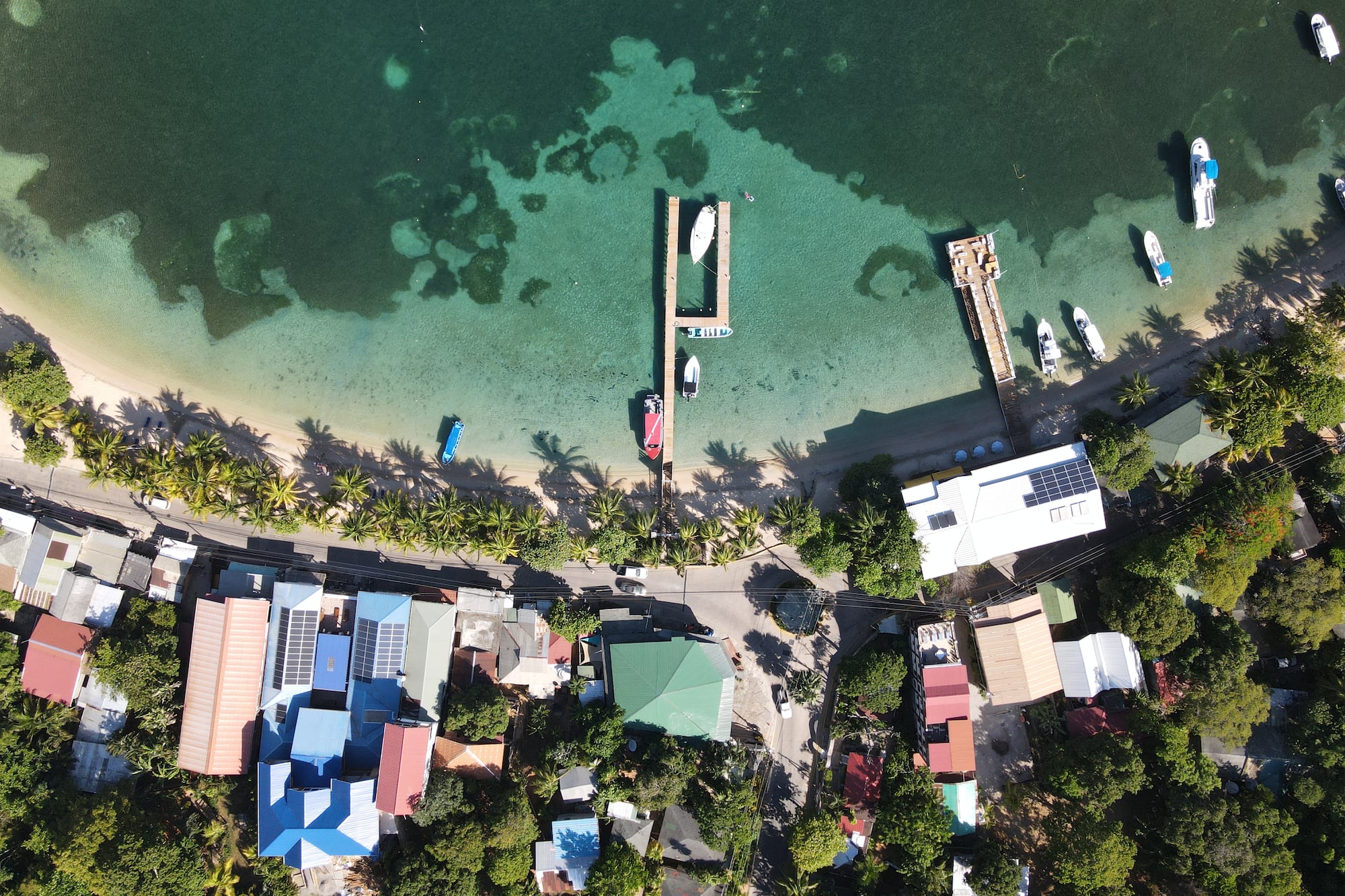 a body of water with boats and buildings
