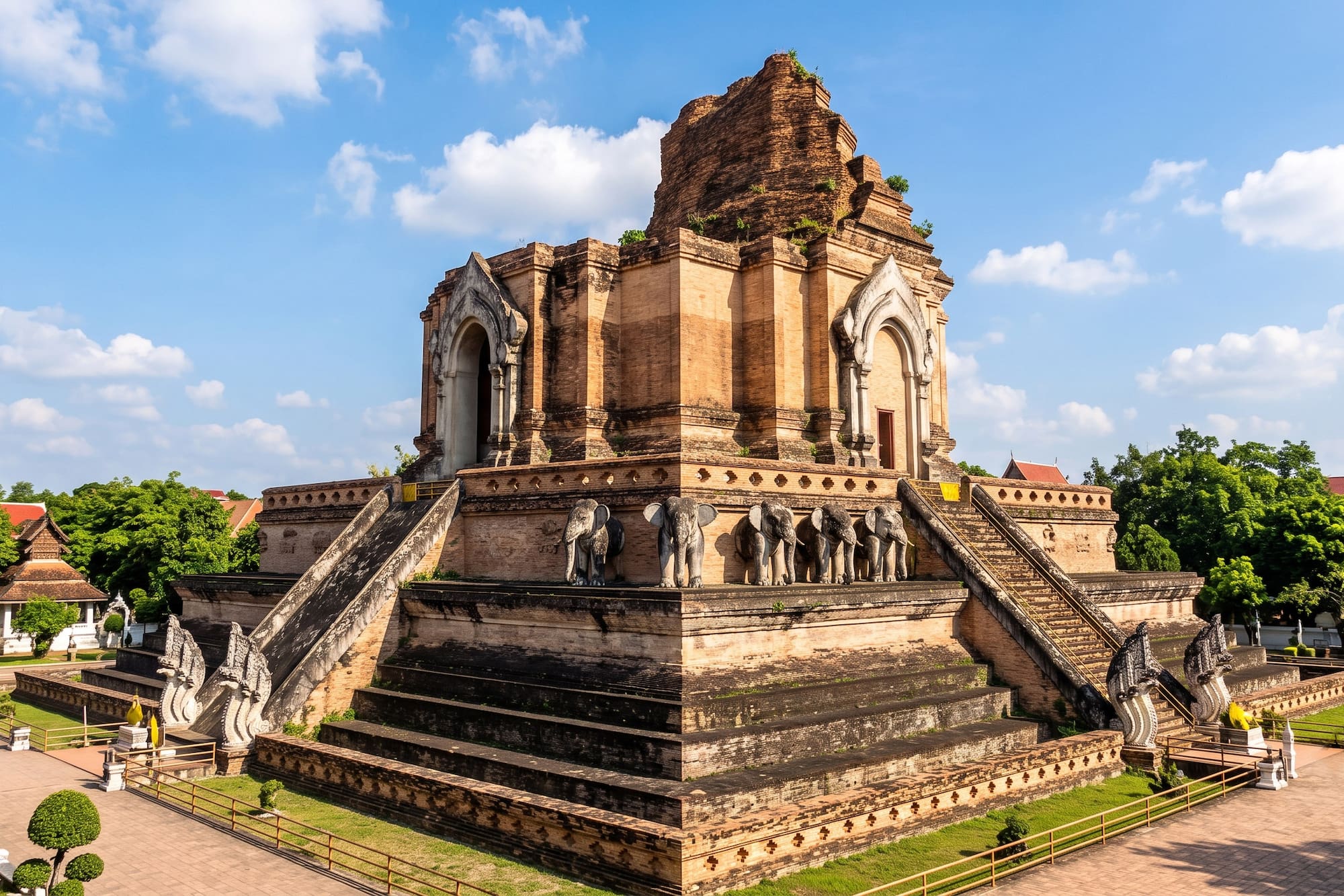 Ancient brick temple ruins with elephant statues, Wat Chedi Luang, Chiang Mai.