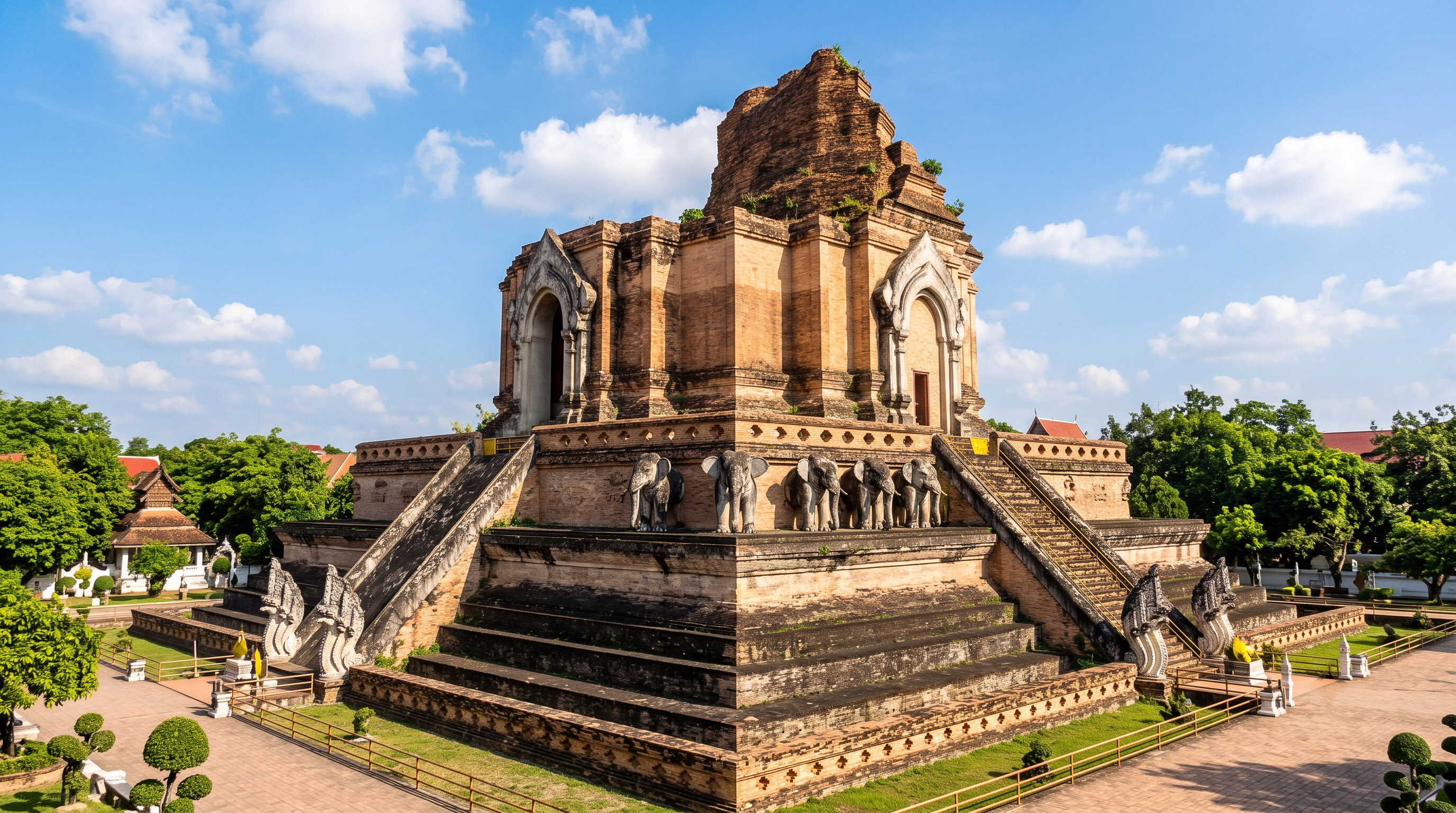 Ancient brick temple ruins with elephant statues, Wat Chedi Luang, Chiang Mai.
