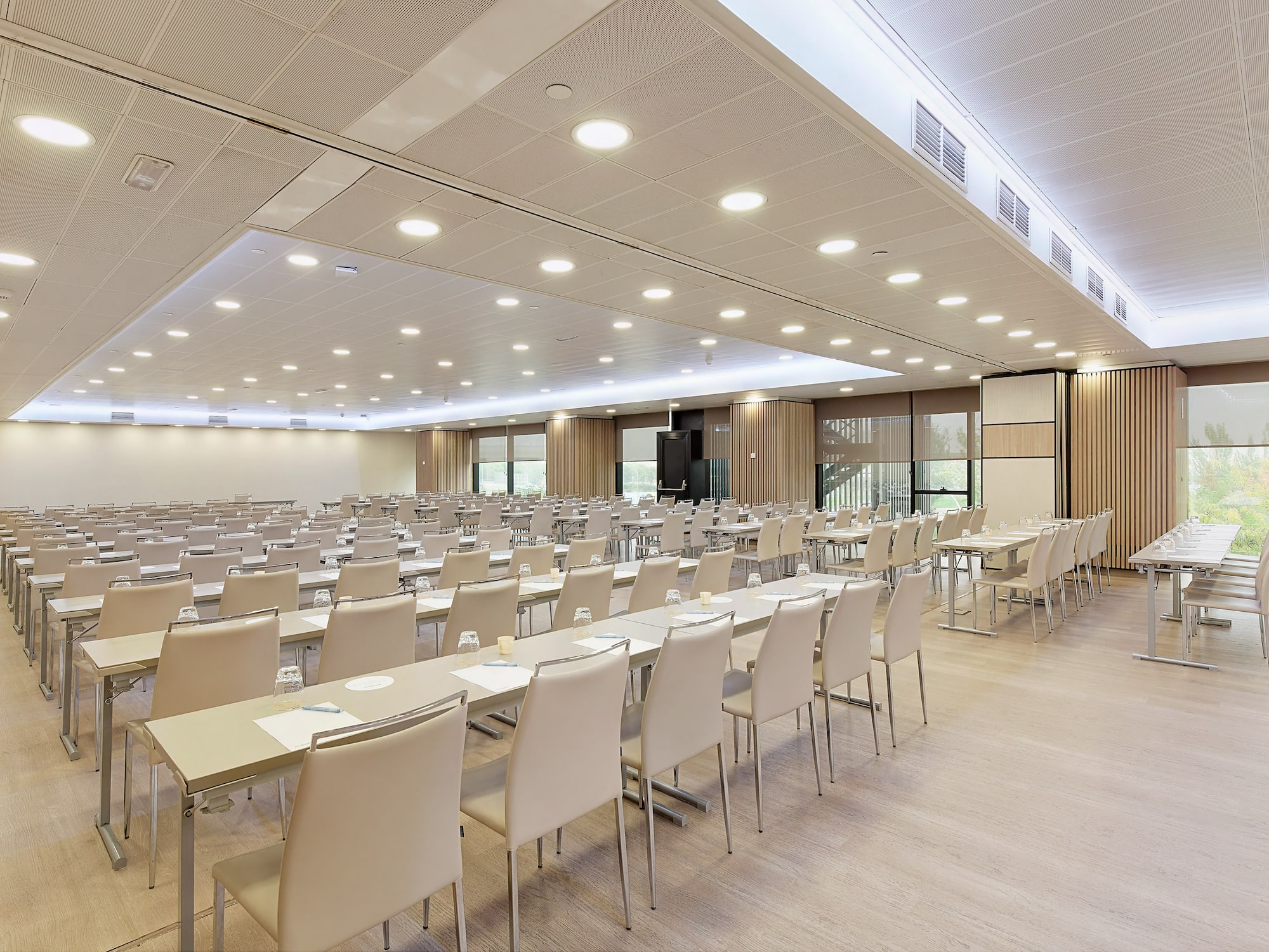 a room with tables and chairs