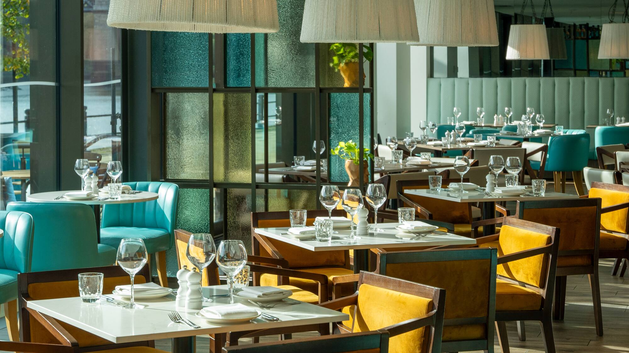 a restaurant with tables and chairs