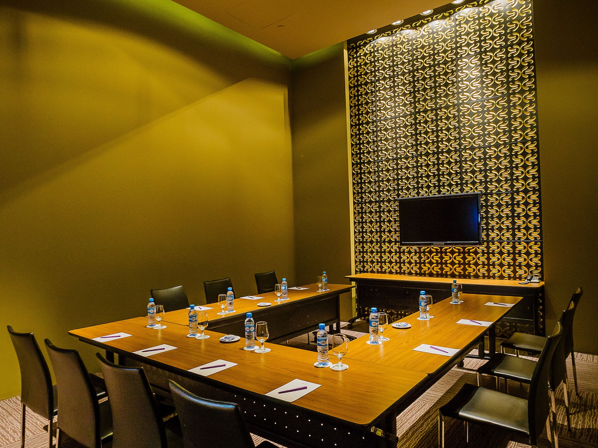 a room with a table and chairs