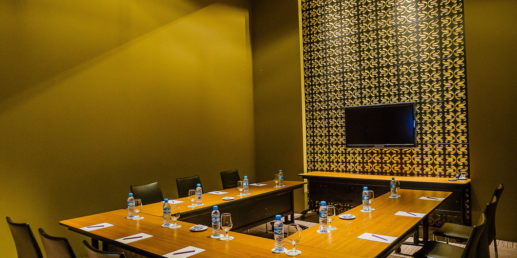 a room with a table and chairs