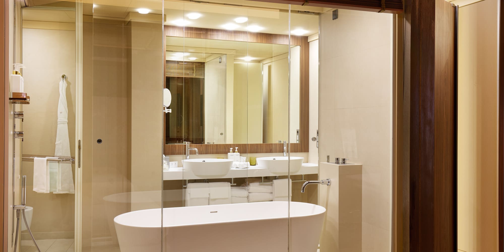 a bathroom with a tub and a mirror