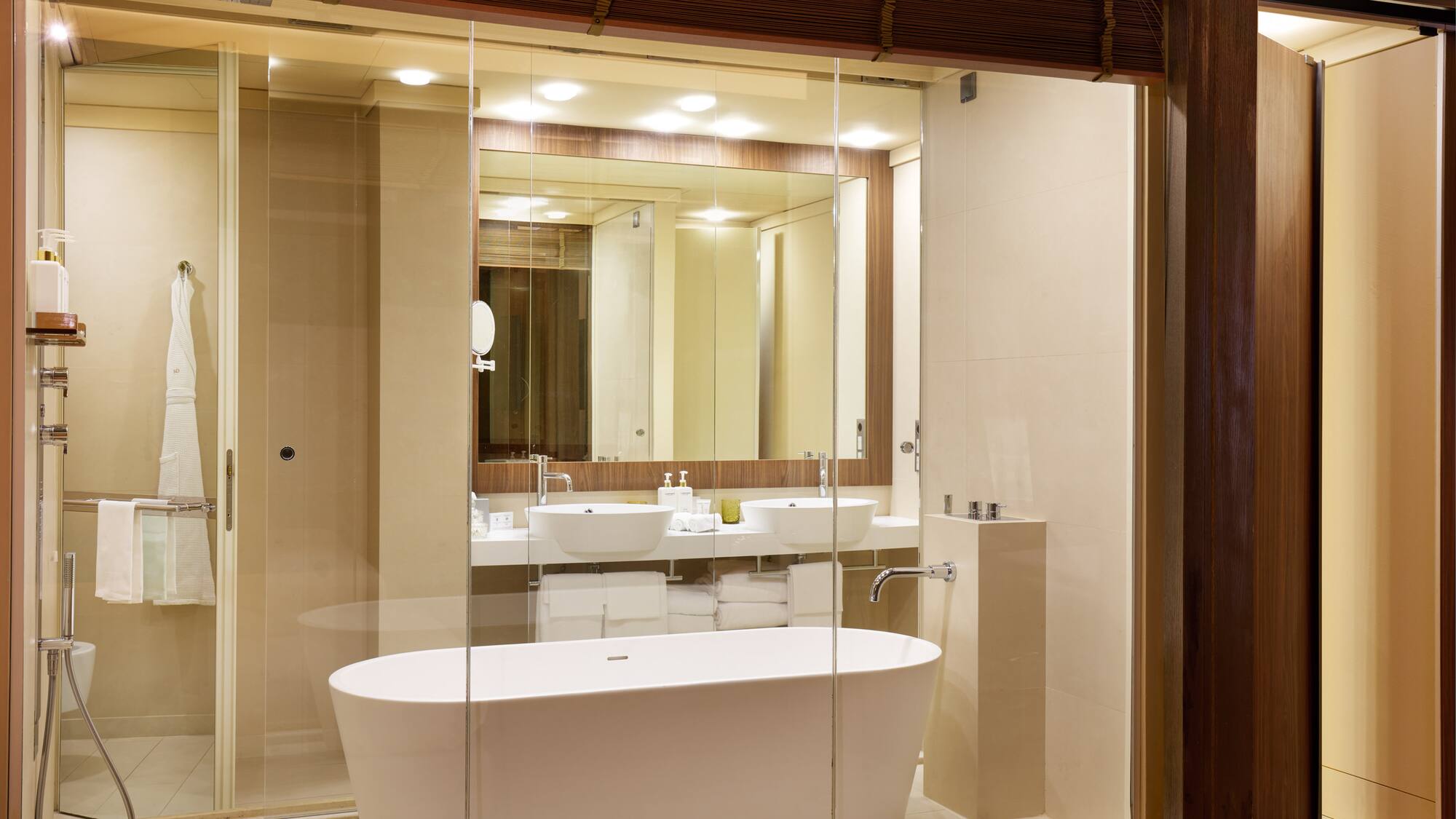 a bathroom with a tub and a mirror