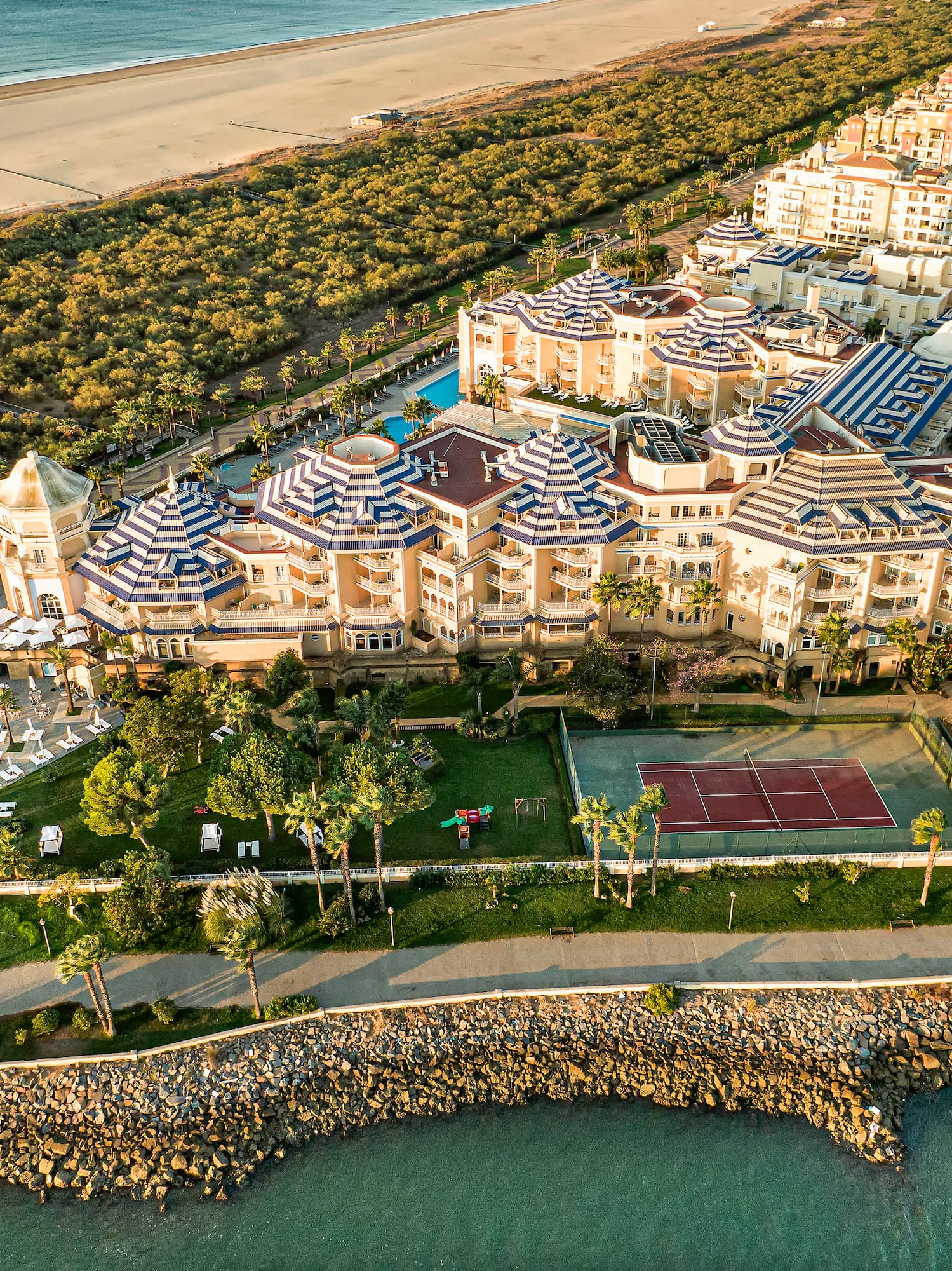 a large building next to a body of water