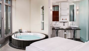 a room with a tub and sink