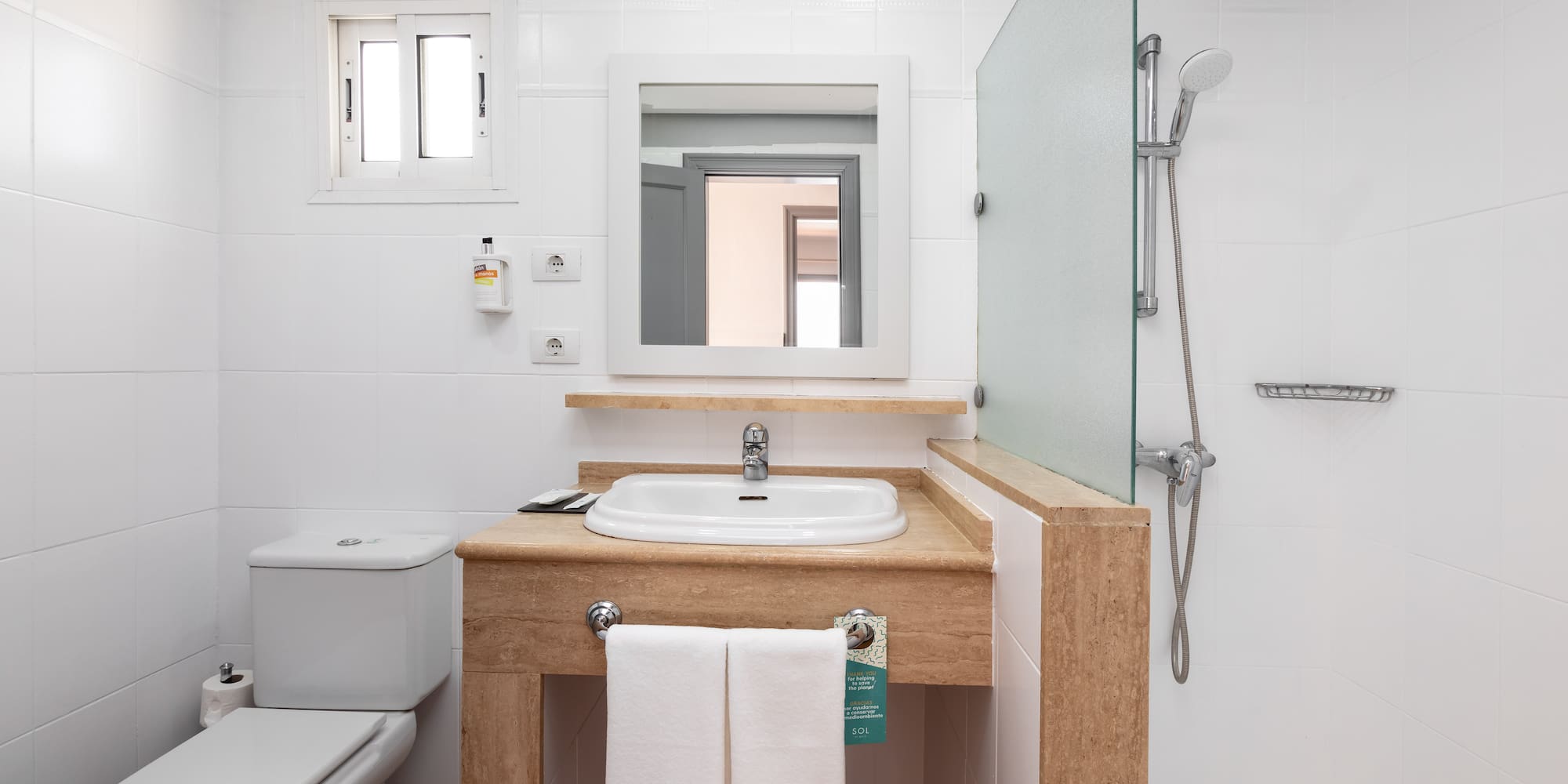 a bathroom with a sink and a shower
