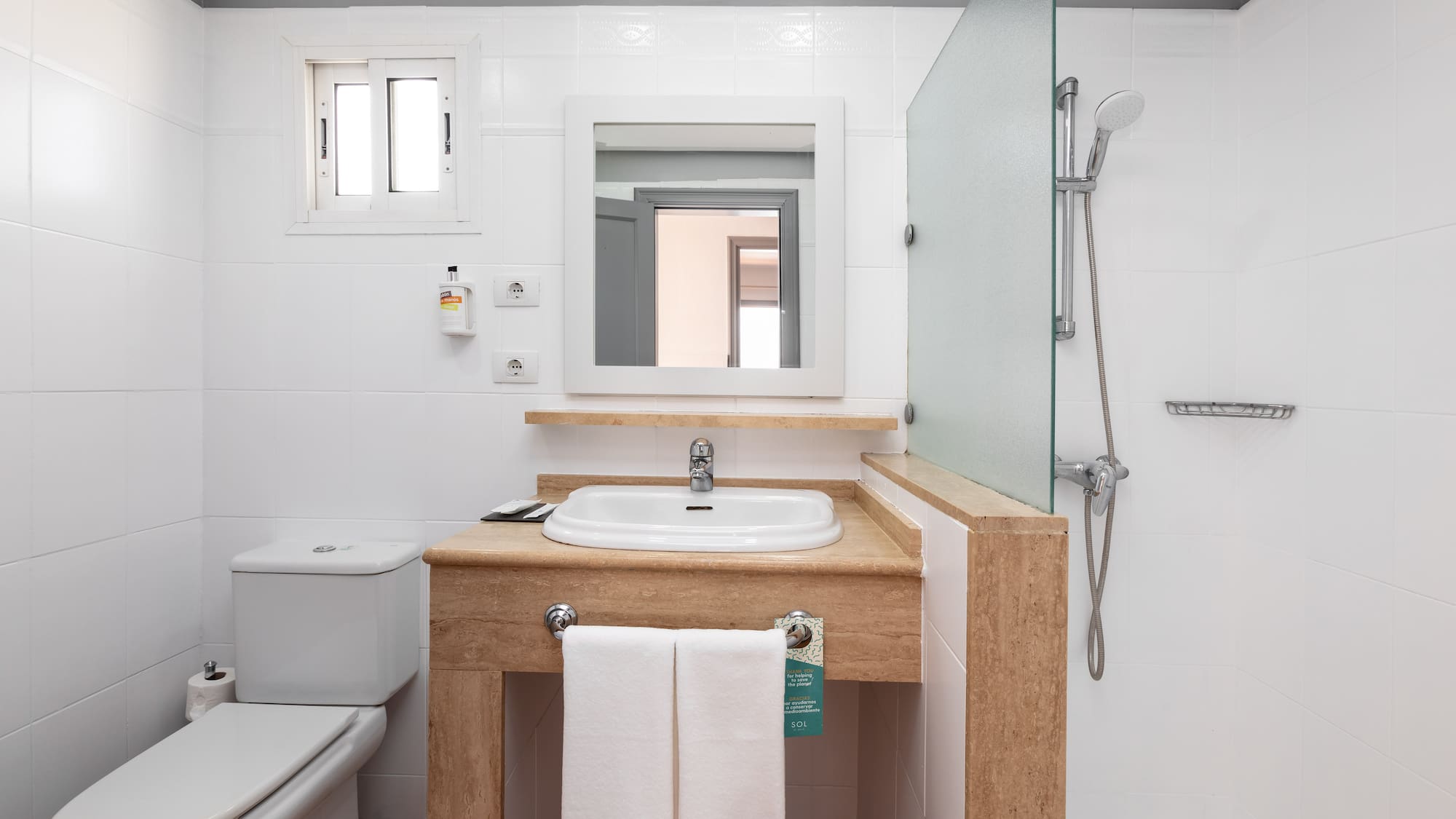 a bathroom with a sink and a shower