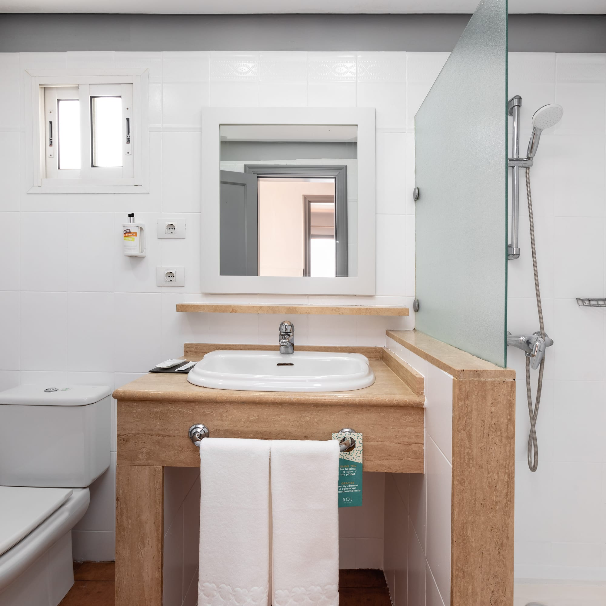 a bathroom with a sink and a shower
