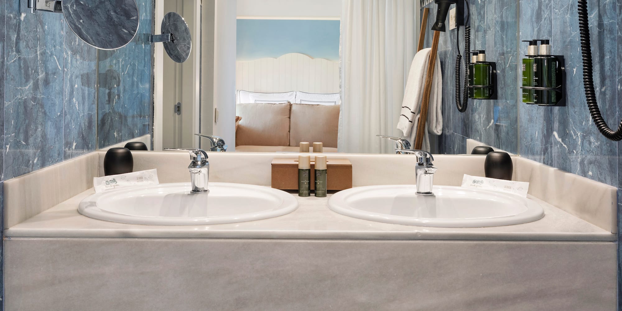 a bathroom with two sinks