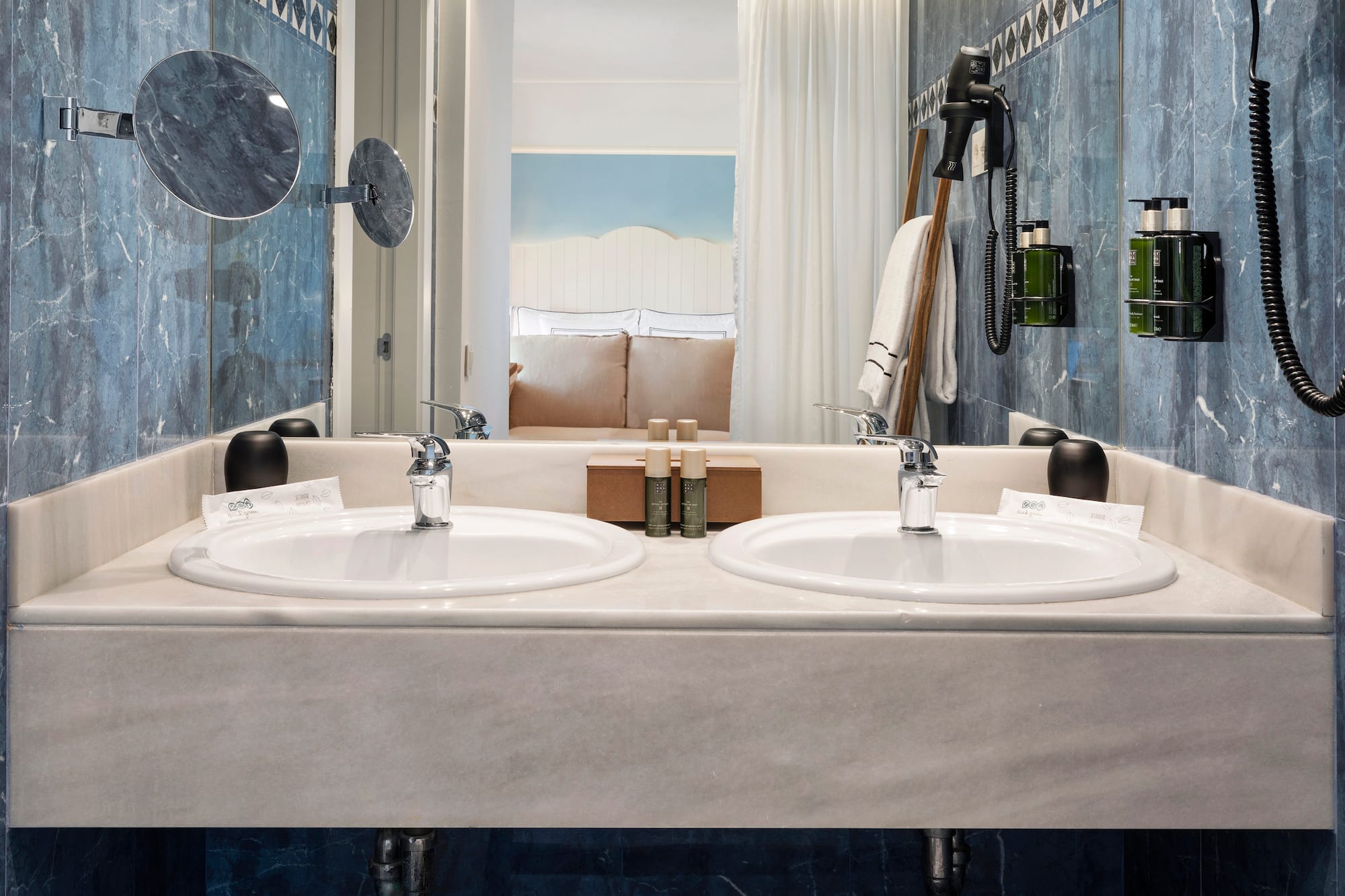 a bathroom with two sinks