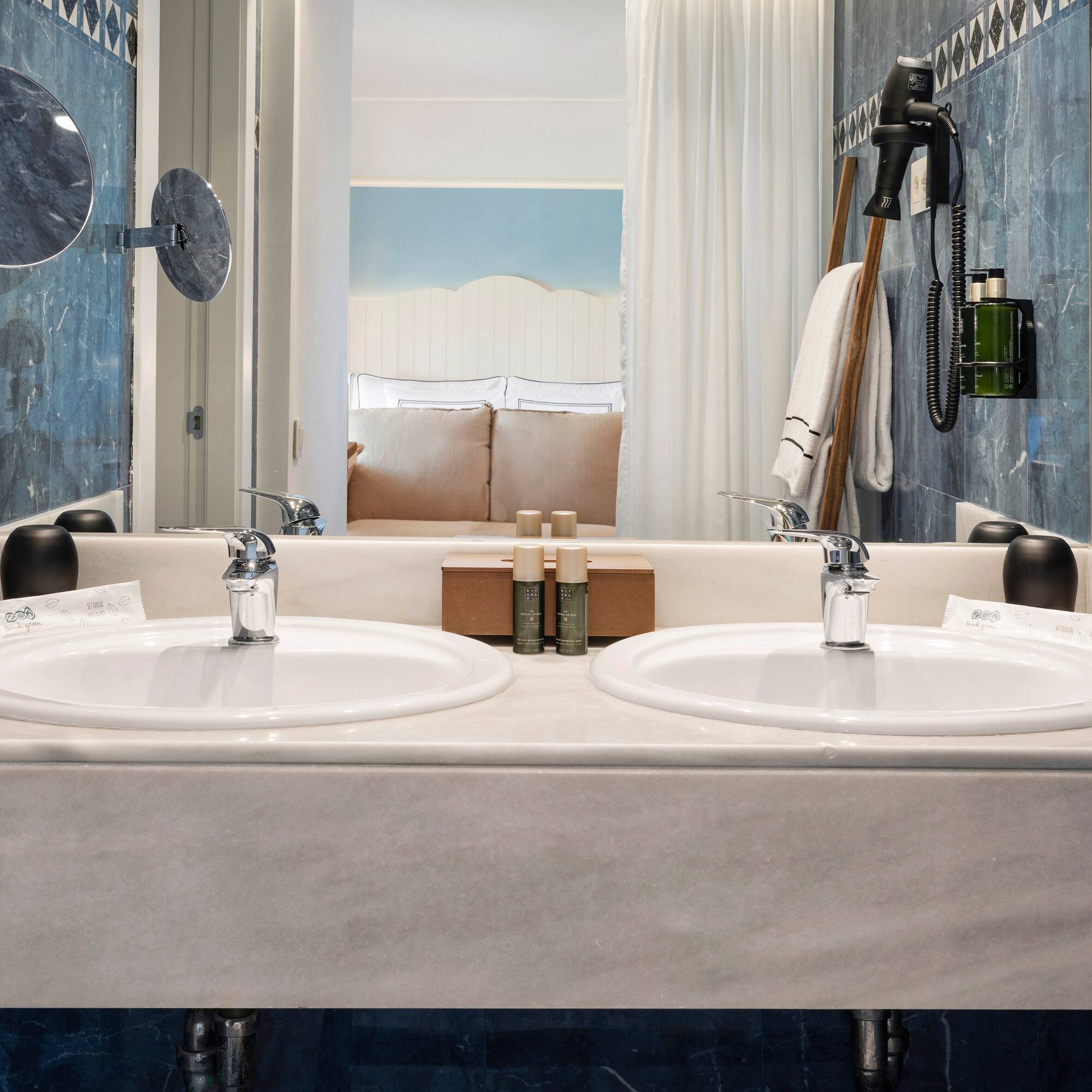 a bathroom with two sinks