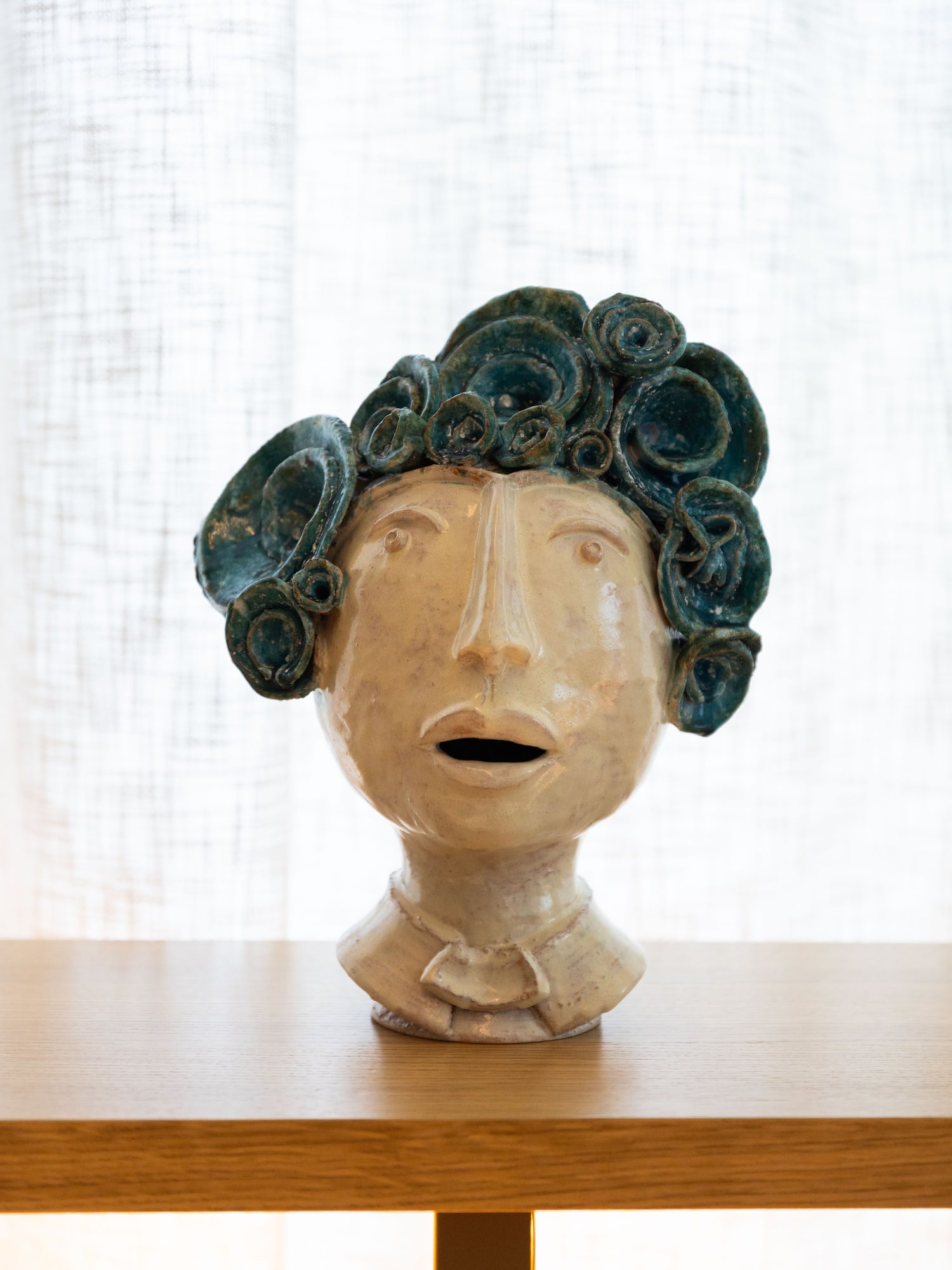a sculpture of a woman's head