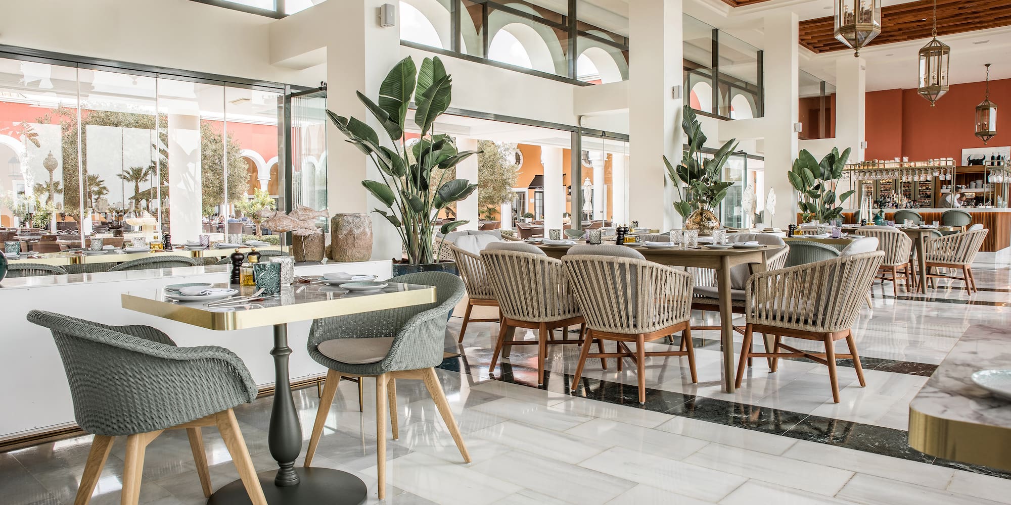 a restaurant with tables and chairs