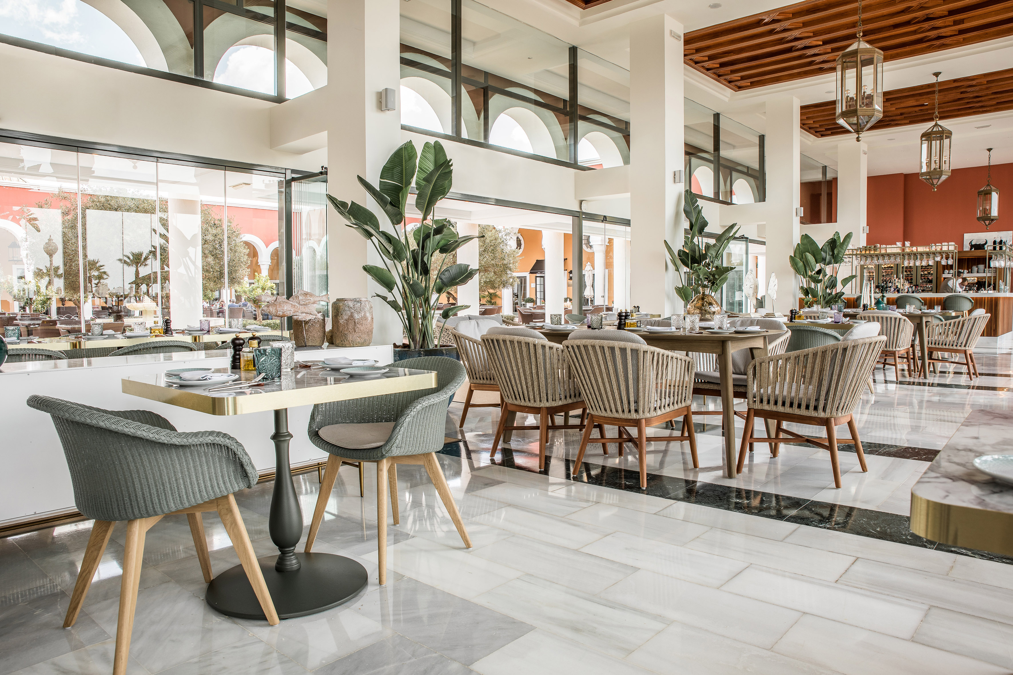 a restaurant with tables and chairs