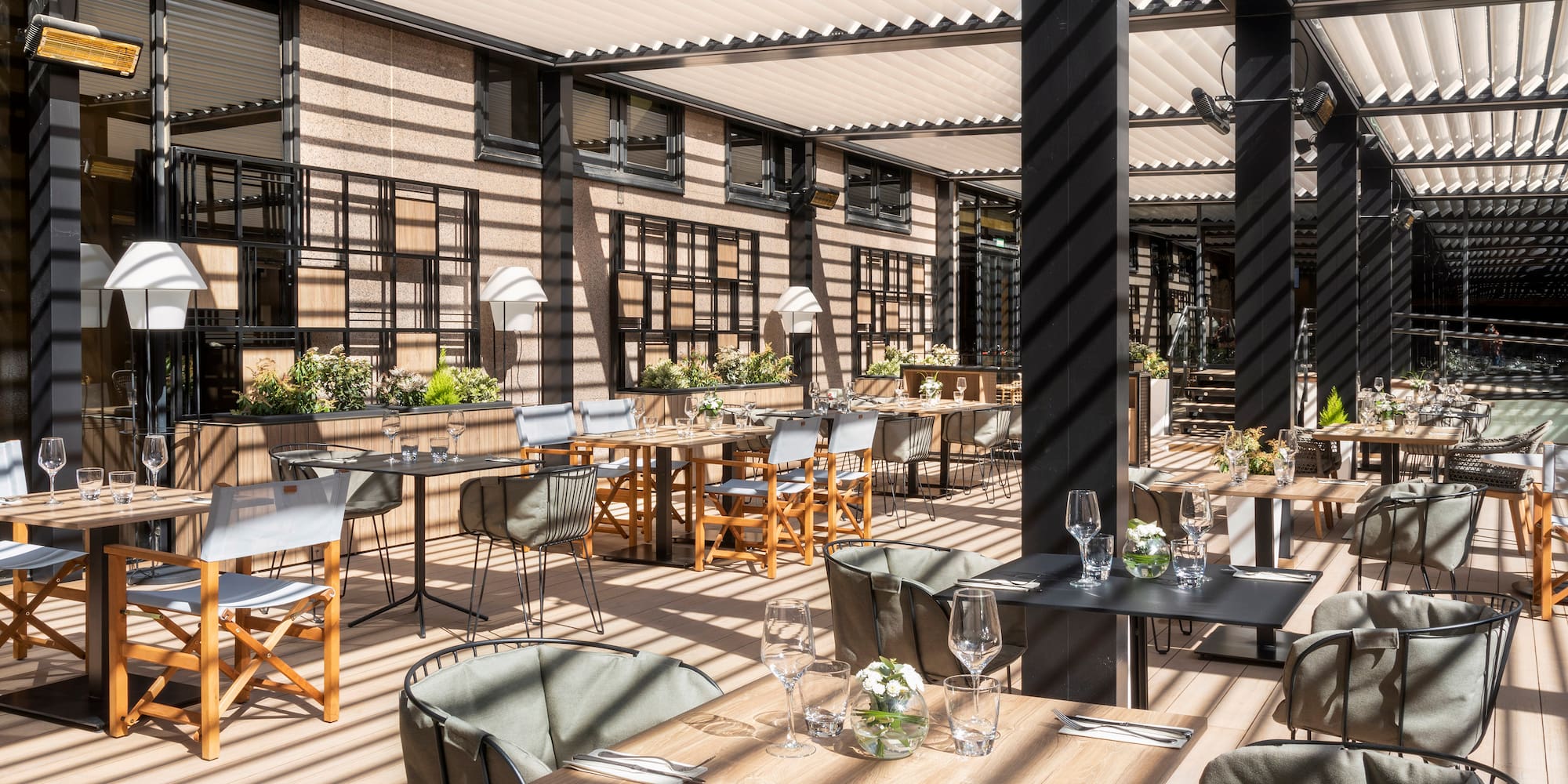 a restaurant with tables and chairs