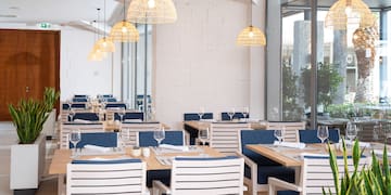 a room with tables and chairs