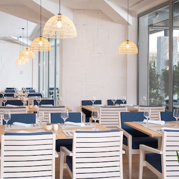 a room with tables and chairs