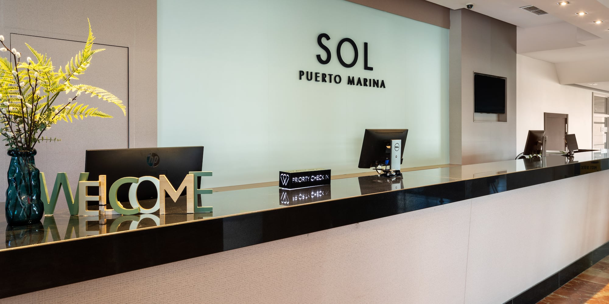 a reception desk in a hotel