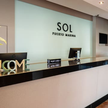 a reception desk in a hotel