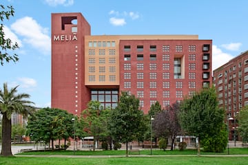 a building with trees in front of it